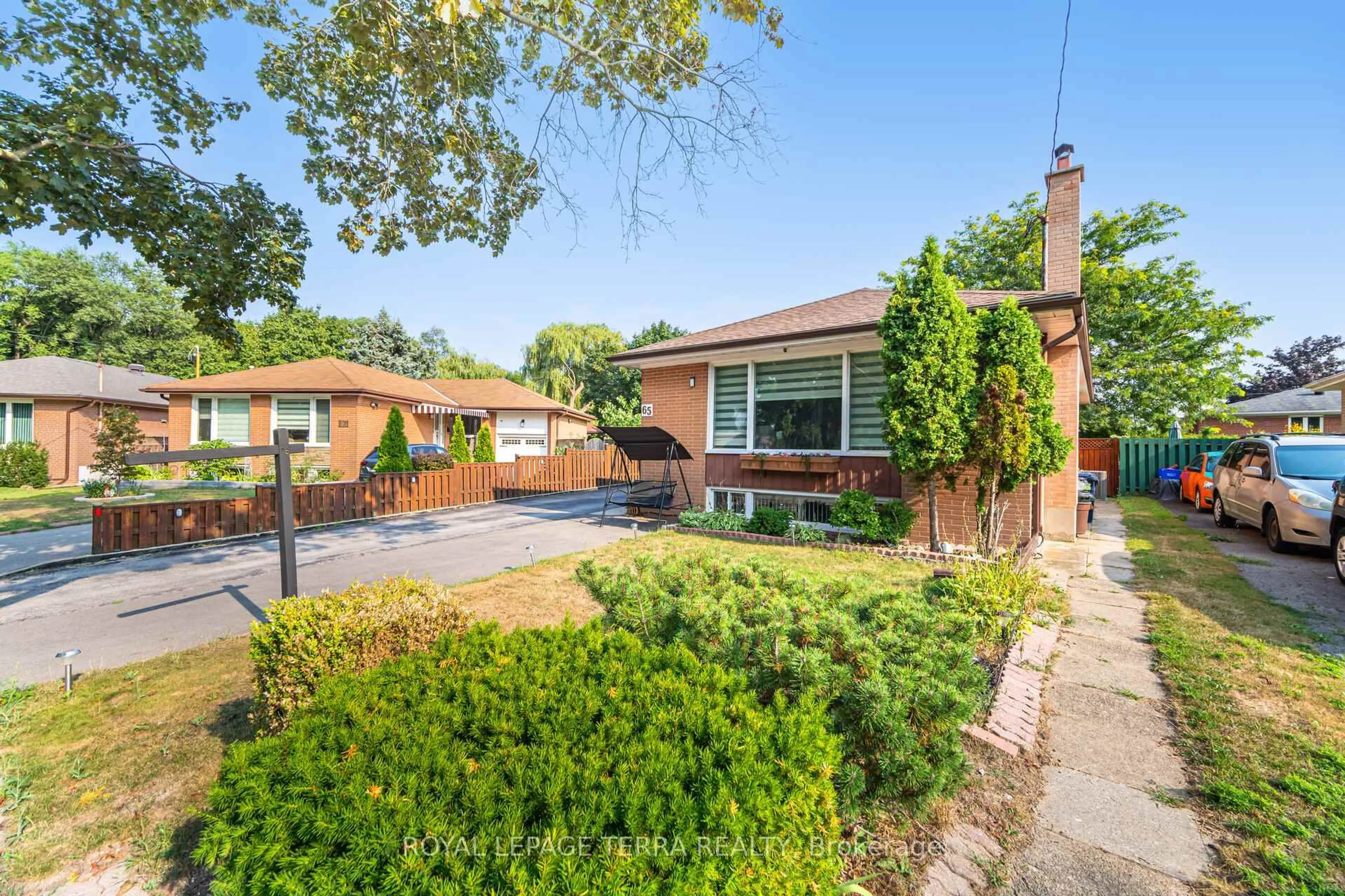 Home with brick exterior material, street for 65 Alhart Dr, Toronto Ontario M9V 2N1