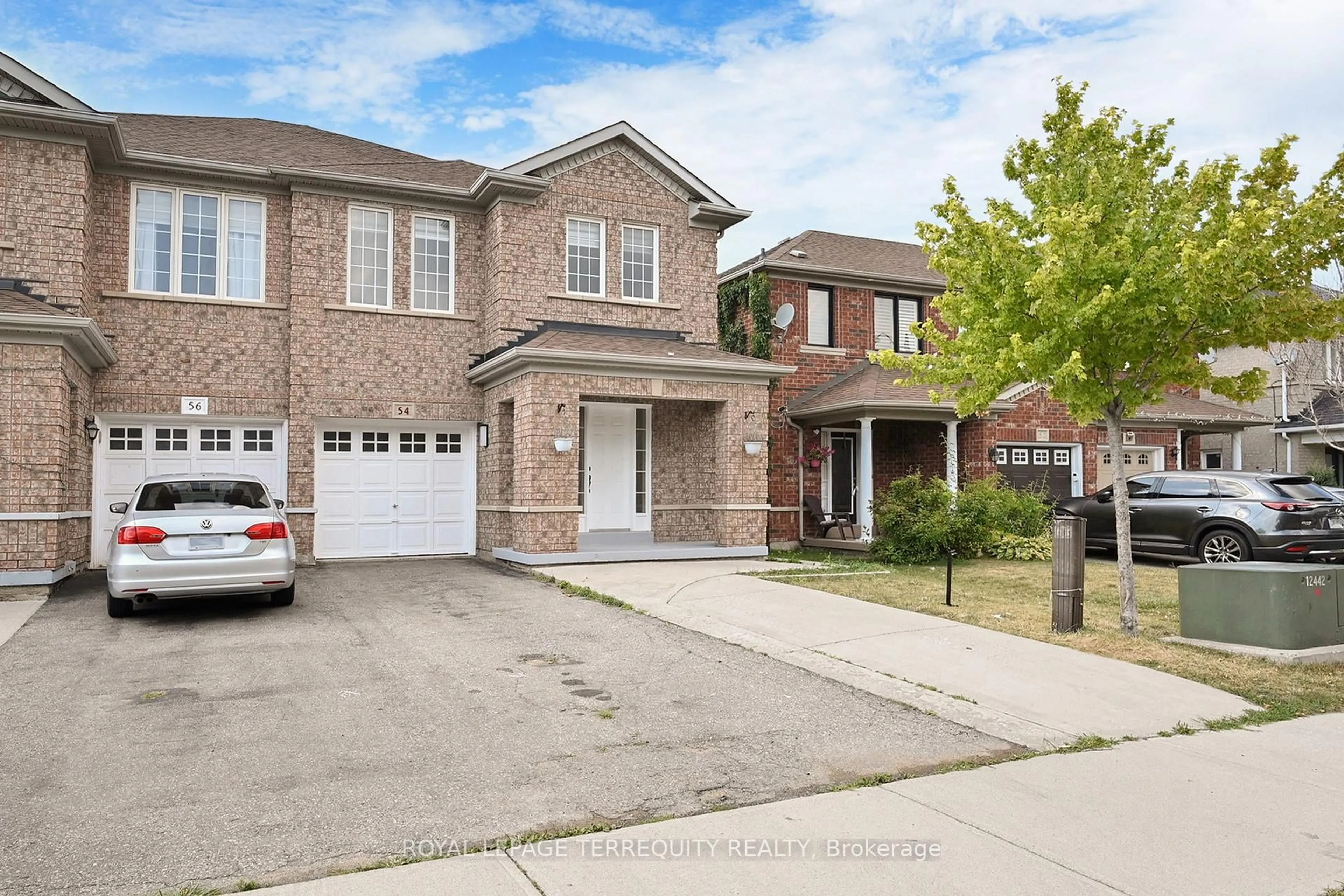 Home with brick exterior material, street for 54 Mistdale Cres, Brampton Ontario L7A 1S1