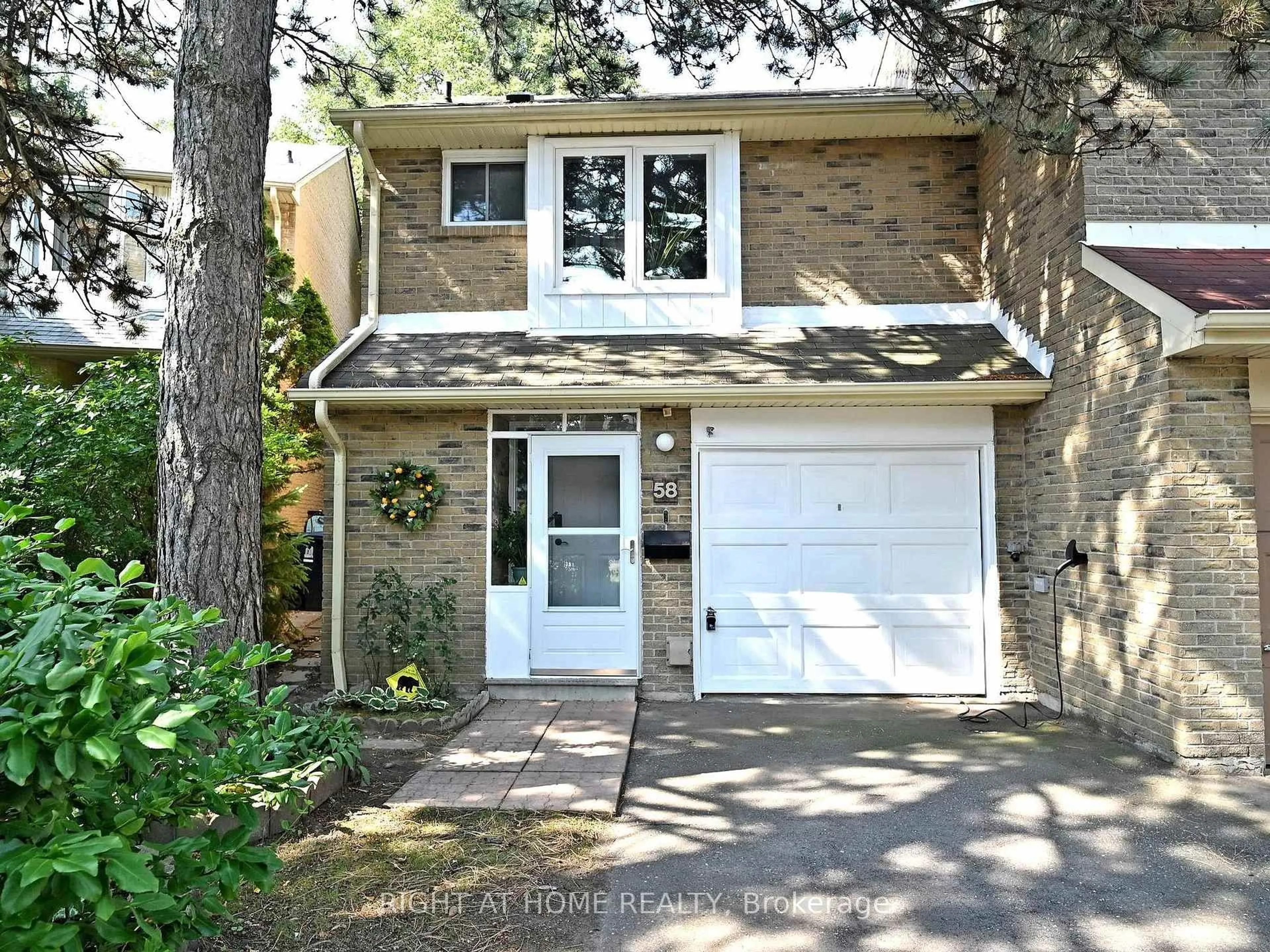 Home with vinyl exterior material, street for 58 Stoneham Rd, Toronto Ontario M9C 4Y9