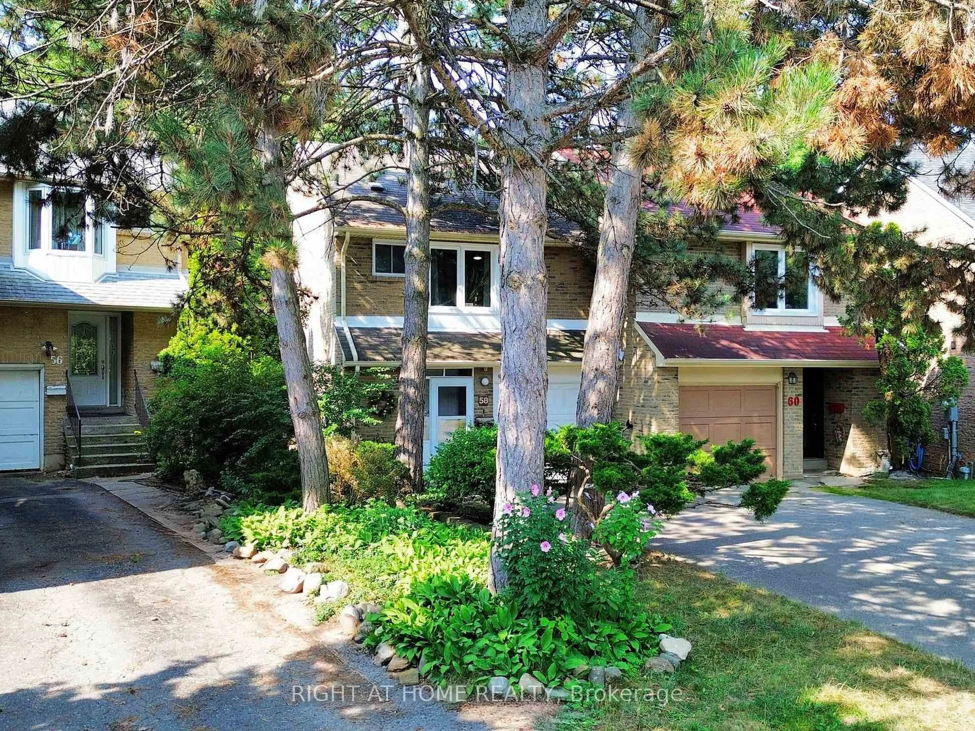 A pic from outside/outdoor area/front of a property/back of a property/a pic from drone, street for 58 Stoneham Rd, Toronto Ontario M9C 4Y9