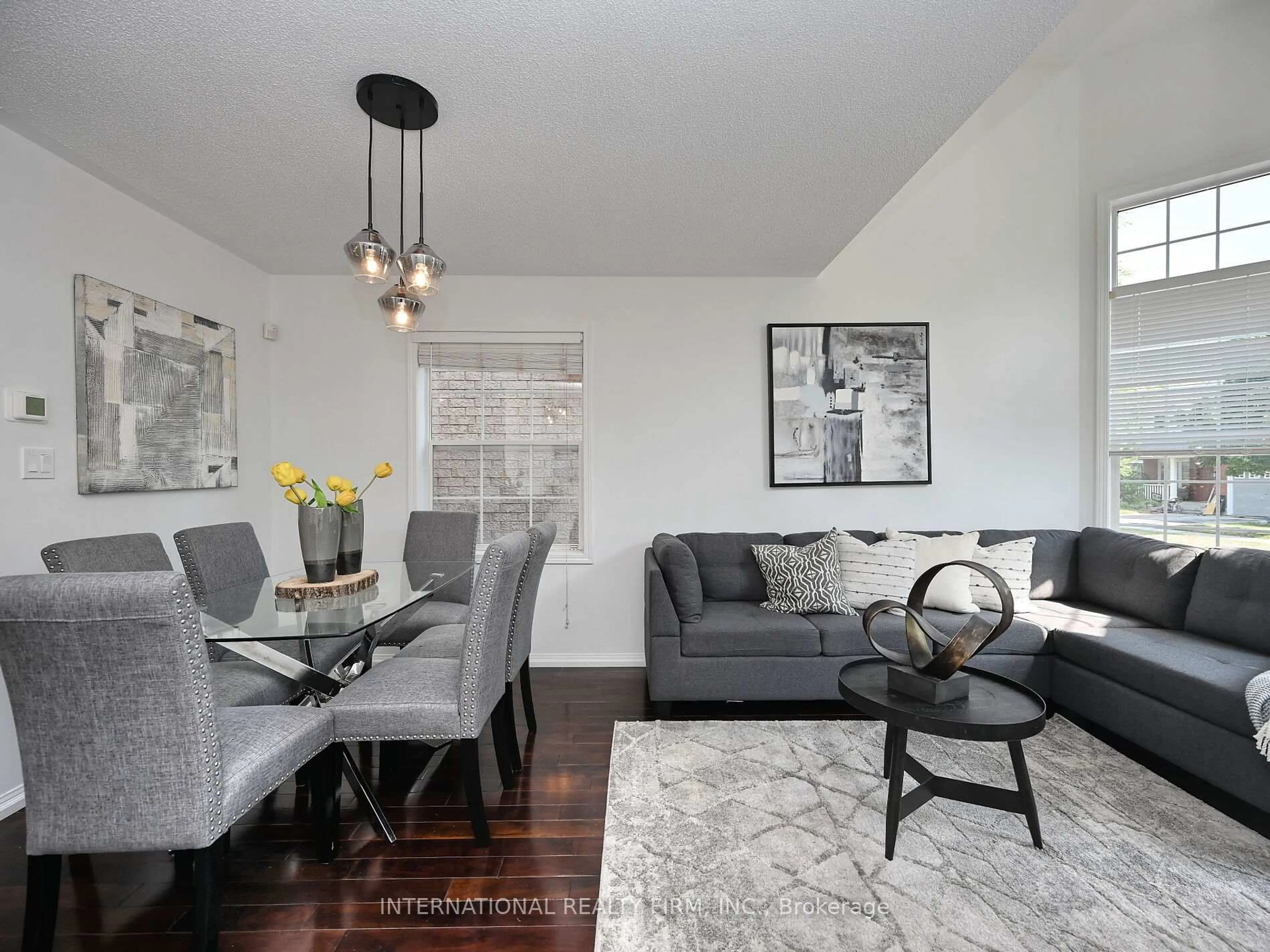 Living room with furniture, wood/laminate floor for 2382 Falkland Cres, Oakville Ontario L6M 4Y1