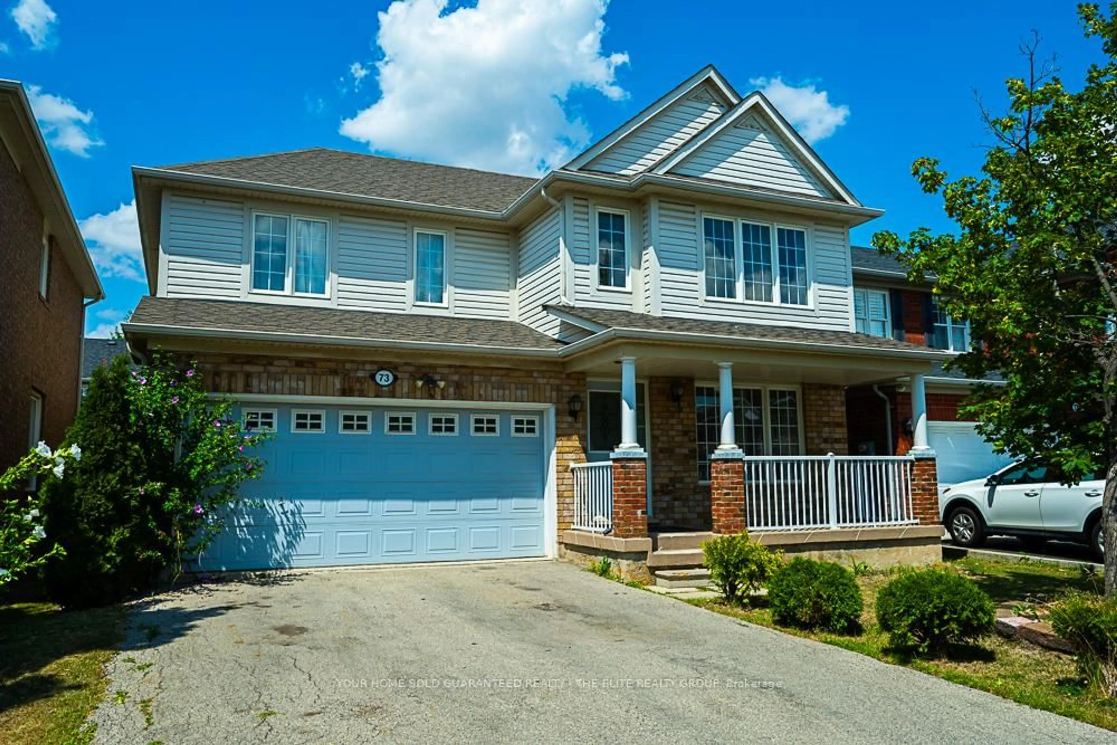 Home with brick exterior material, street for 73 Botavia Downs Dr, Brampton Ontario L7A 3R5