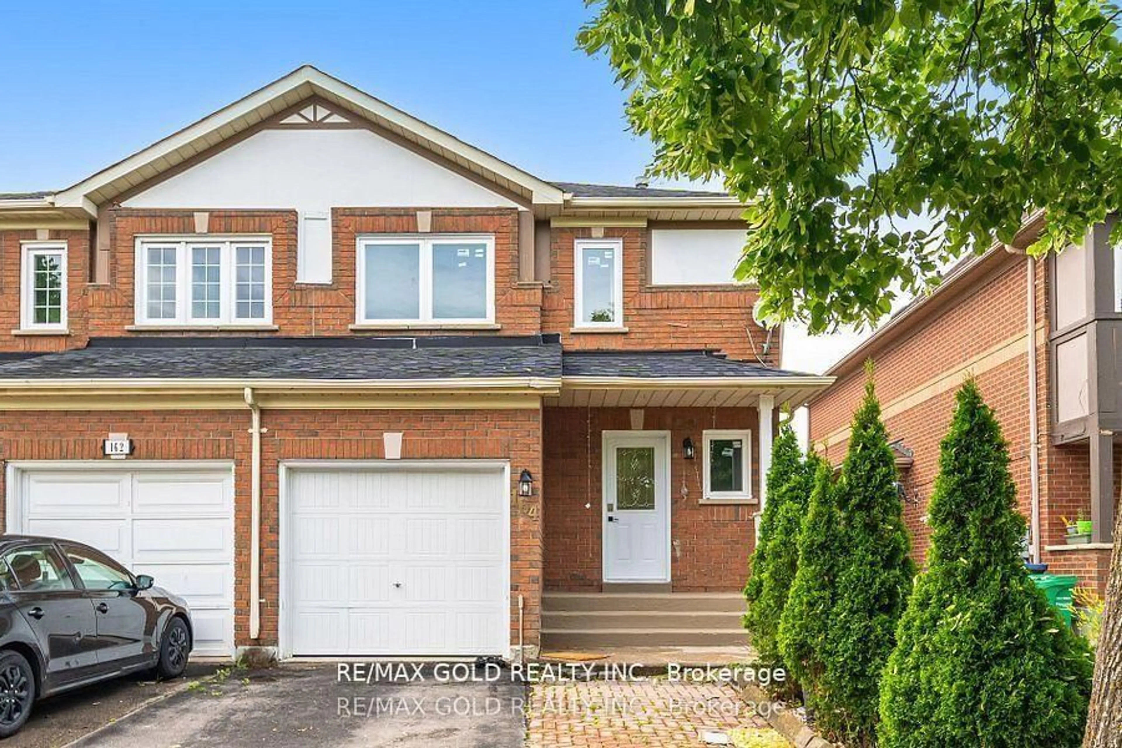 Home with brick exterior material, street for 164 Rainforest Dr, Brampton Ontario L6R 1A4
