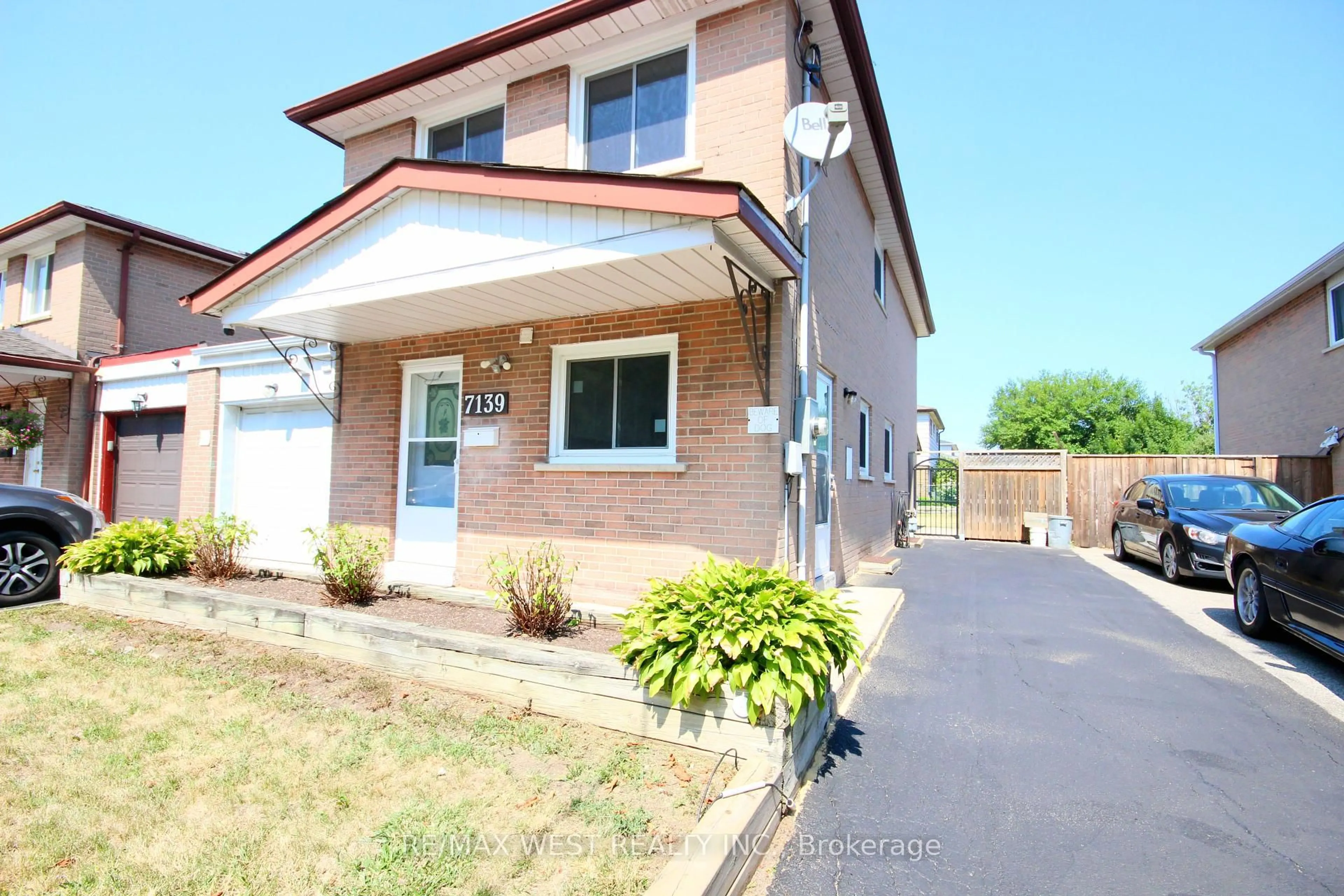 Home with brick exterior material, street for 7139 Darcel Ave, Mississauga Ontario L4T 2X1