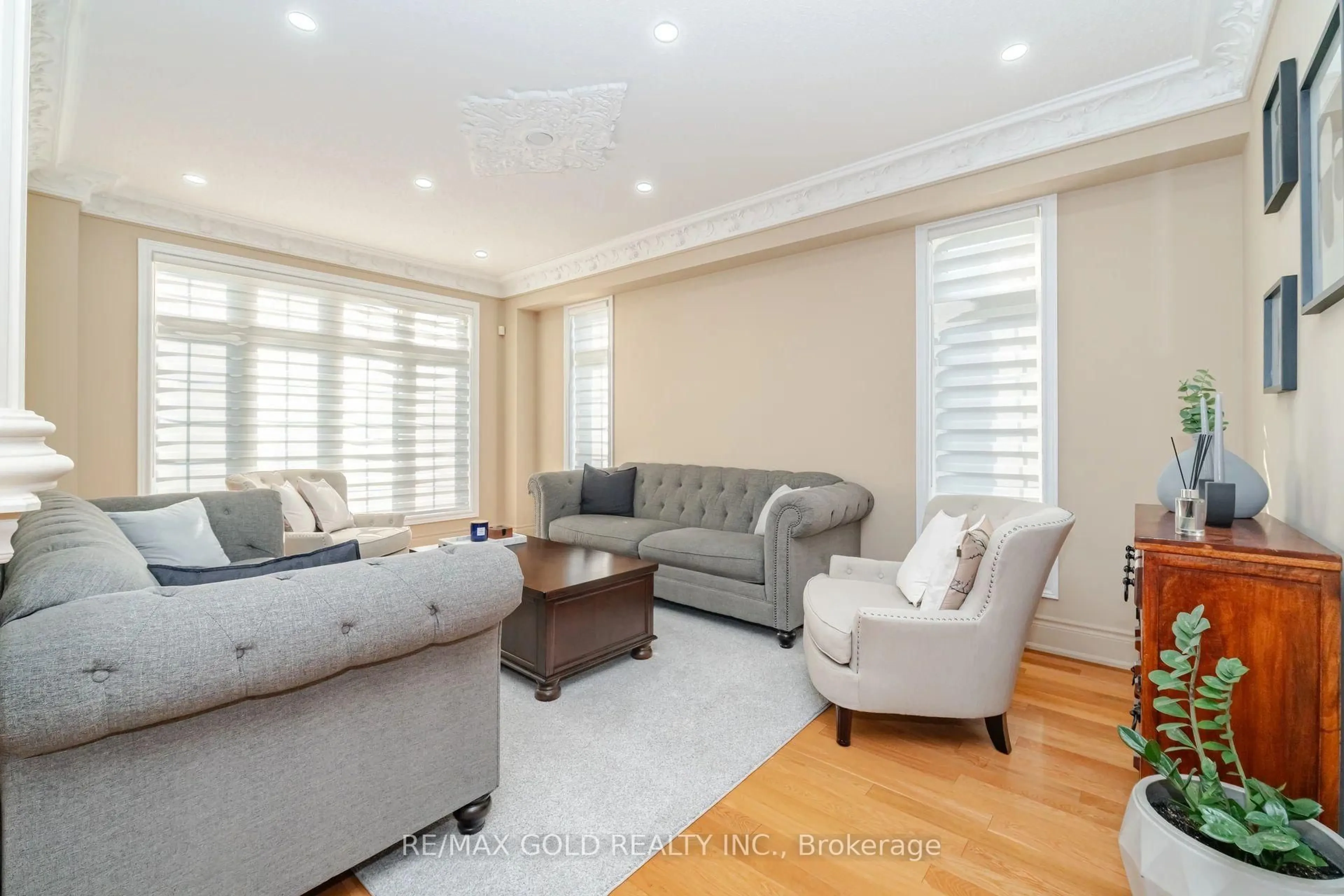 Living room with furniture, wood/laminate floor for 41 Leparc Rd, Brampton Ontario L6P 2W8