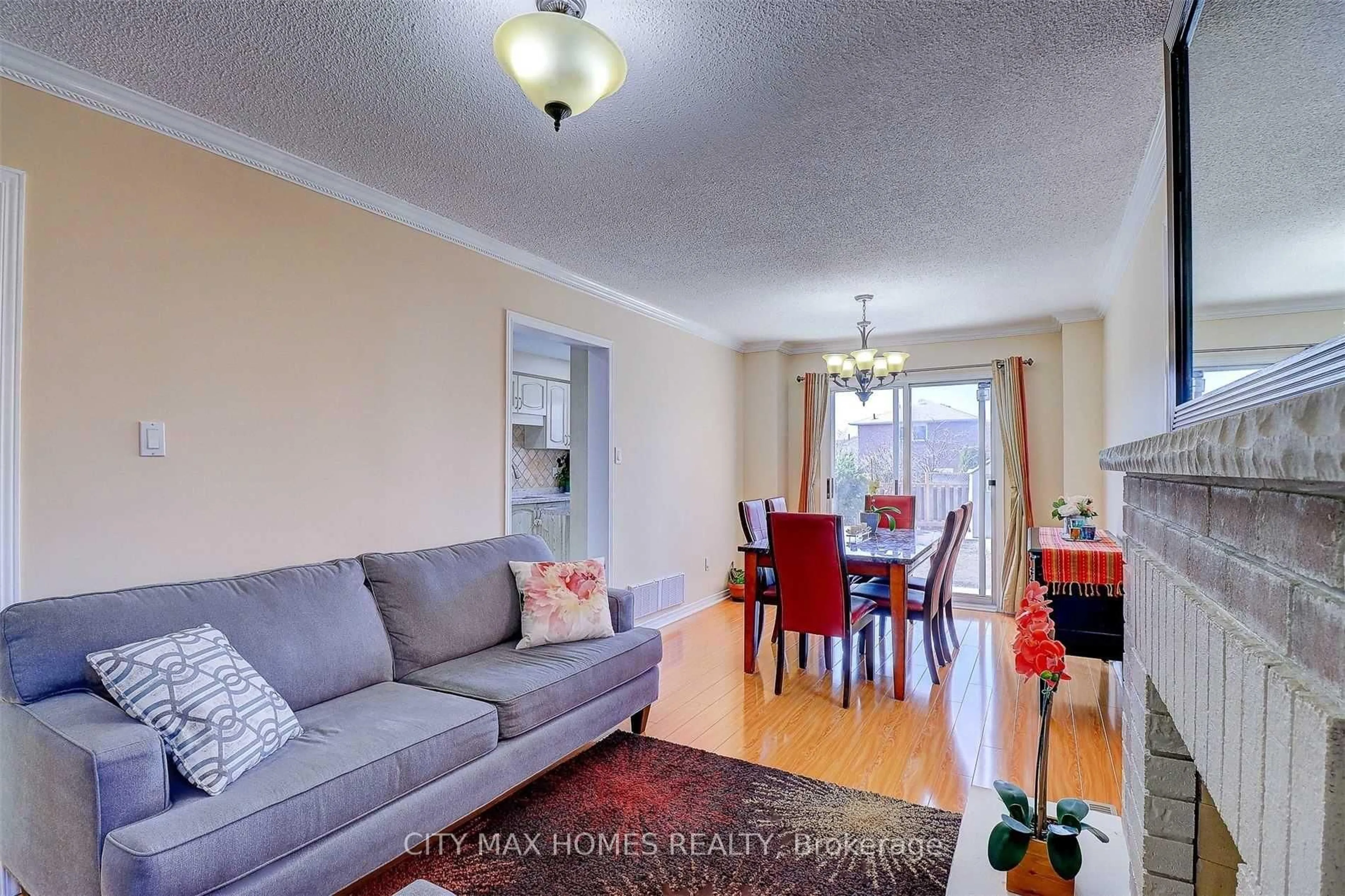 Living room with furniture, wood/laminate floor for 4 Cranberry Cres, Brampton Ontario L6Y 4P6