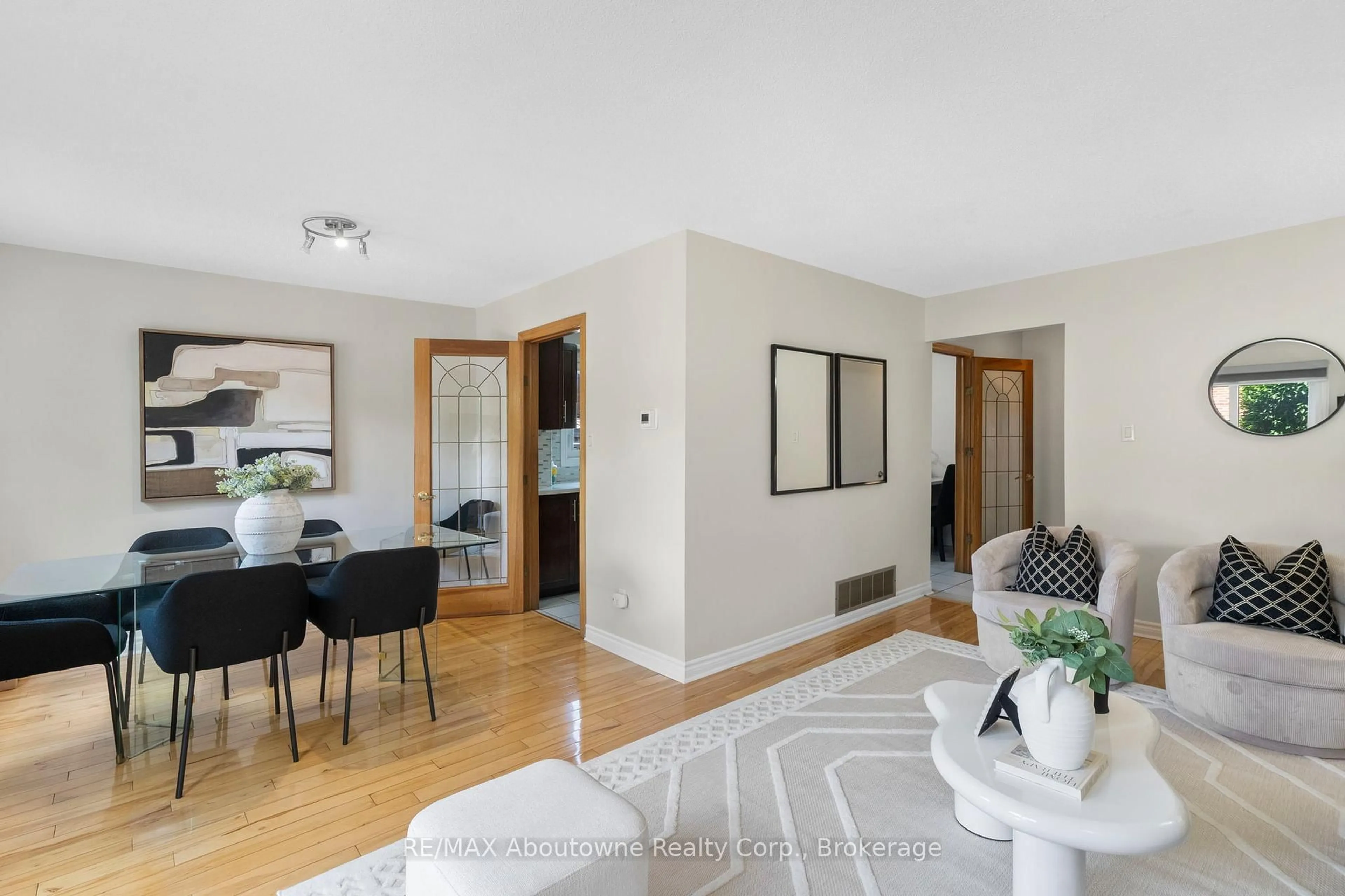 Living room with furniture, wood/laminate floor for 17 Adam St, Brampton Ontario L6Z 2S2