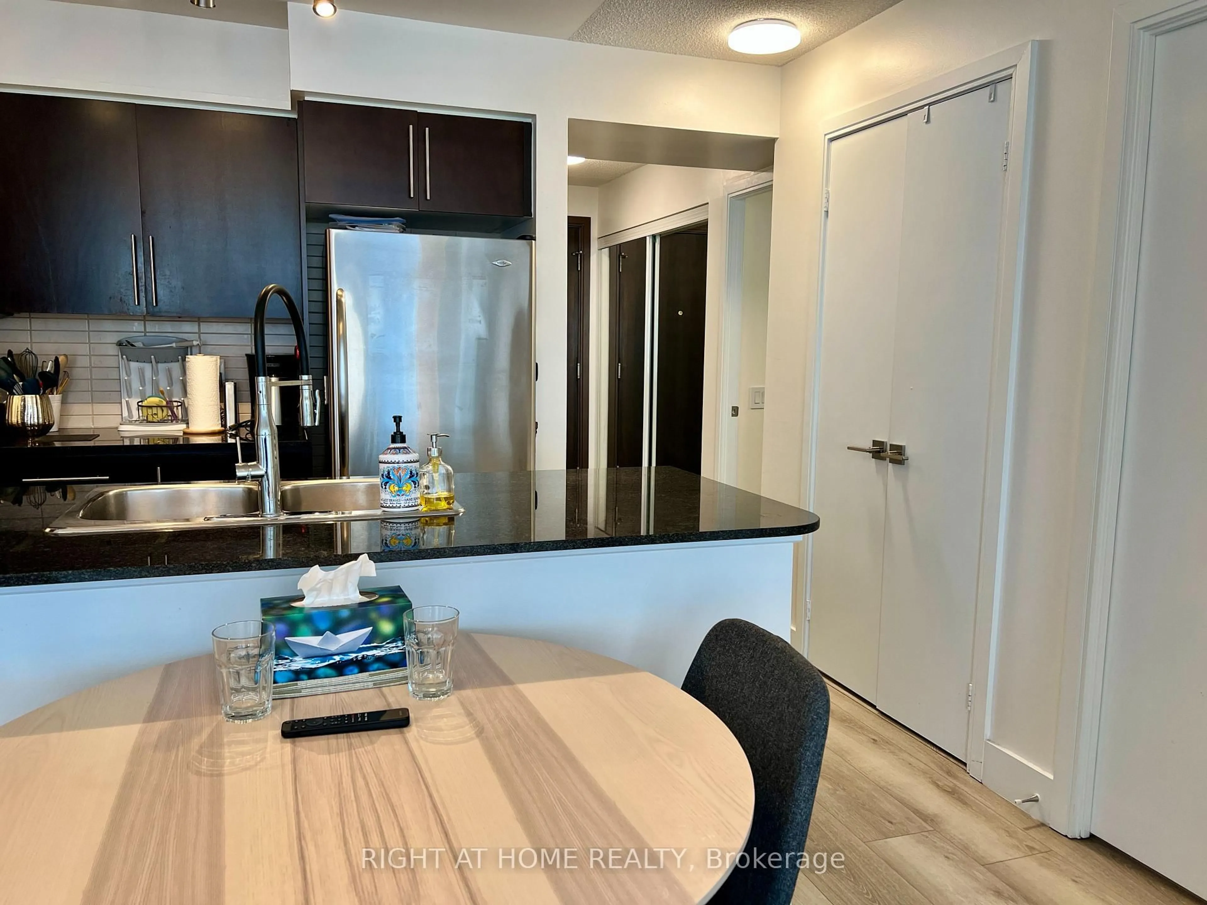 Open concept kitchen, wood/laminate floor for 35 Viking Lane #2331, Toronto Ontario M9B 0A2