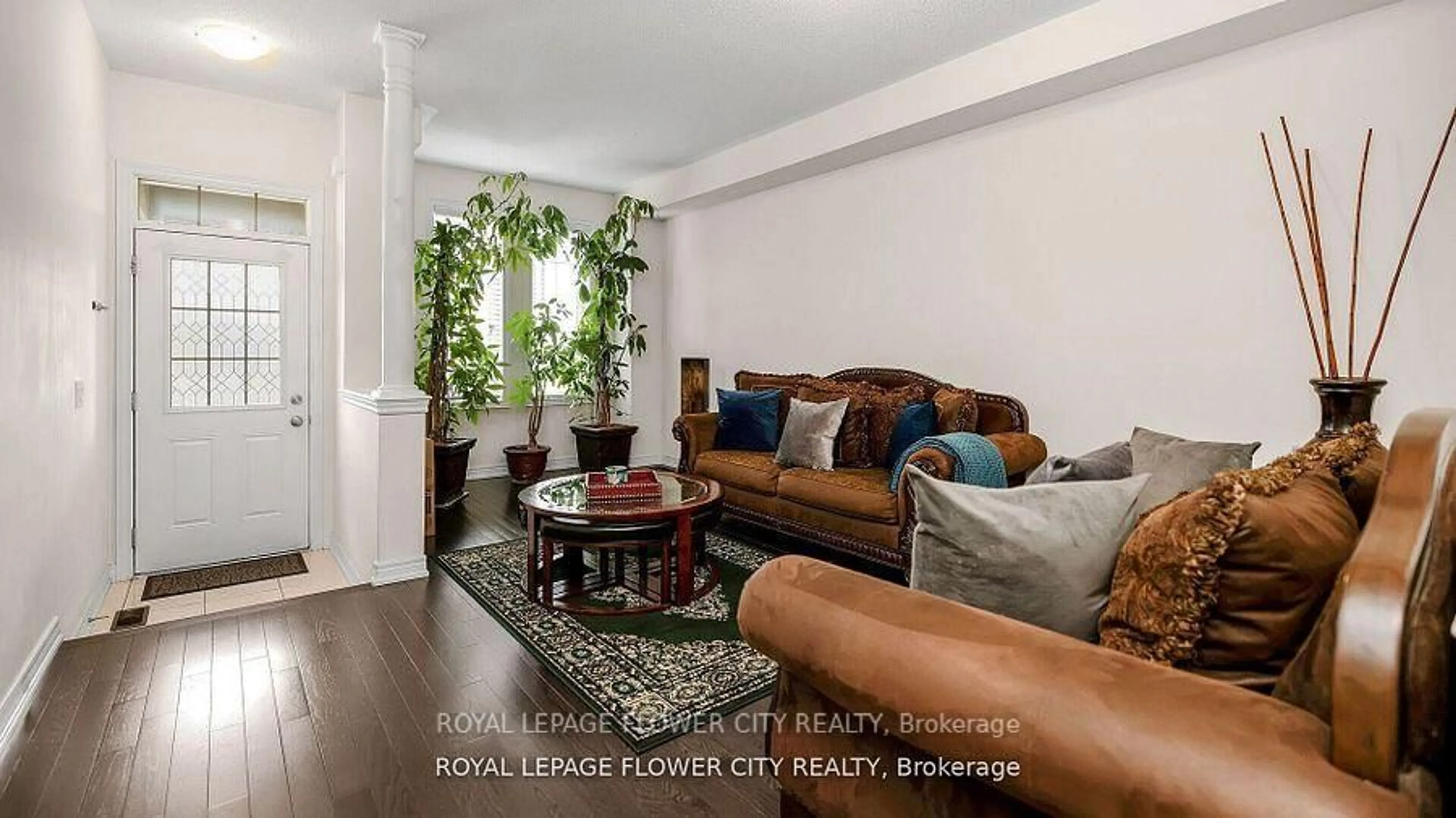 Living room with furniture, wood/laminate floor for 36 Spokanne St, Brampton Ontario L6R 4A2