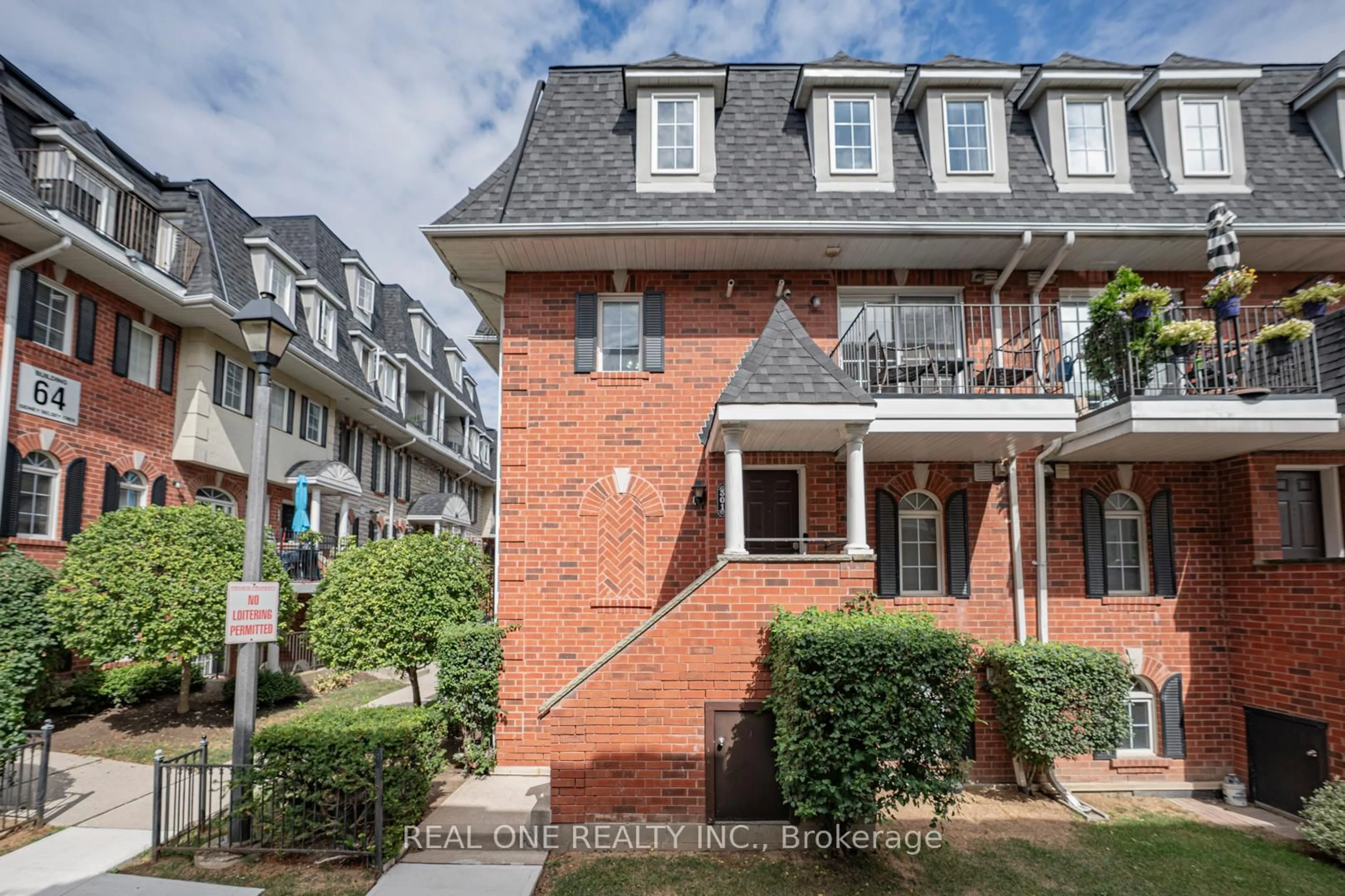 Home with brick exterior material, street for 66 Sidney Belsey Cres #301, Toronto Ontario M6M 5J4