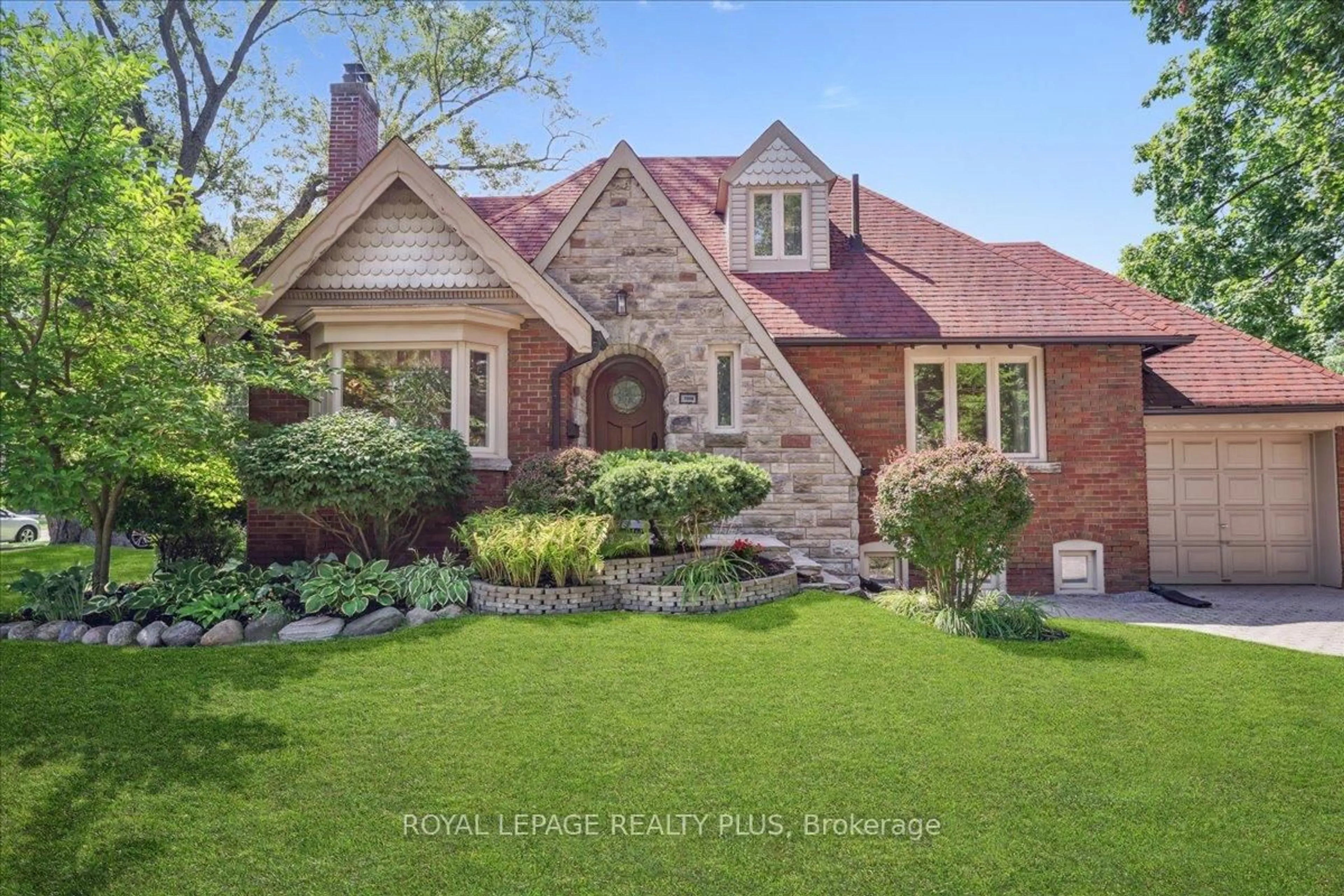 Home with brick exterior material, street for 1048 Royal York Rd, Toronto Ontario M8X 2G7