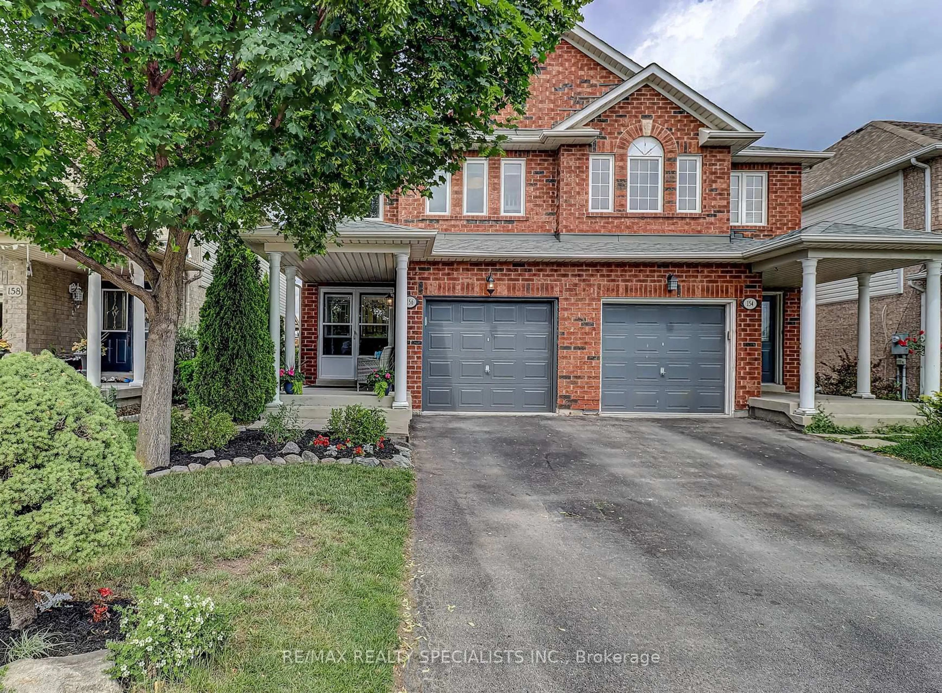 Home with brick exterior material, street for 156 Manley Lane, Milton Ontario L9T 5T1