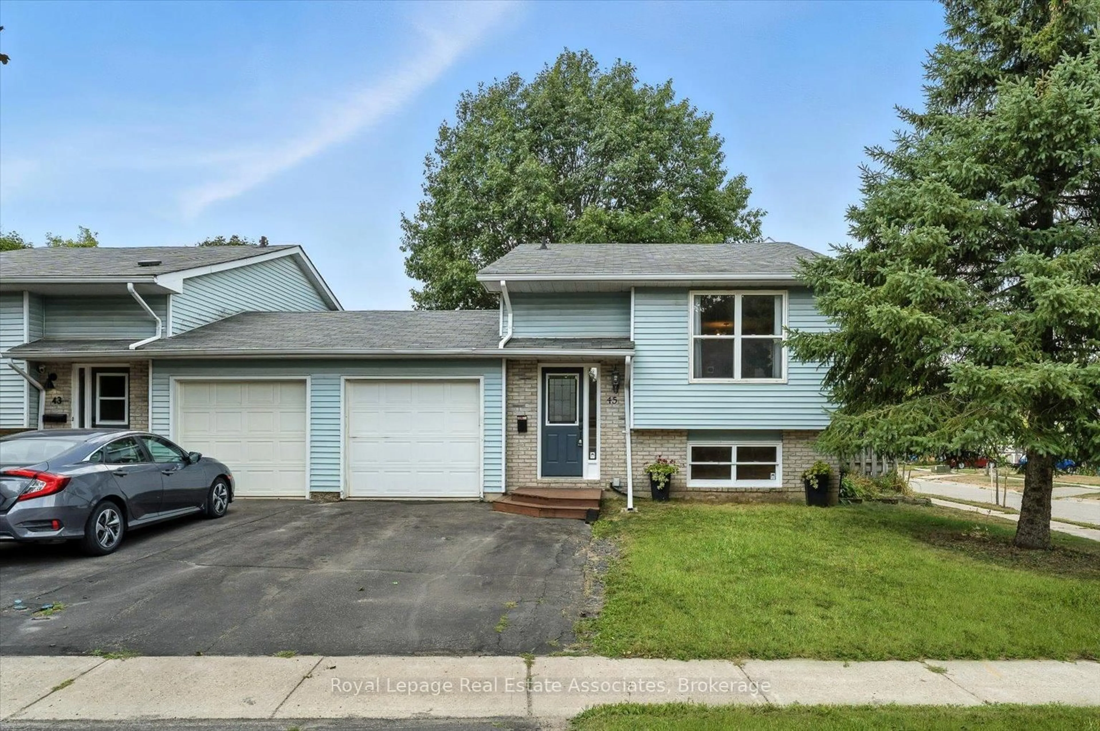 Home with vinyl exterior material, street for 45 Quarry Dr, Orangeville Ontario L9W 3S6