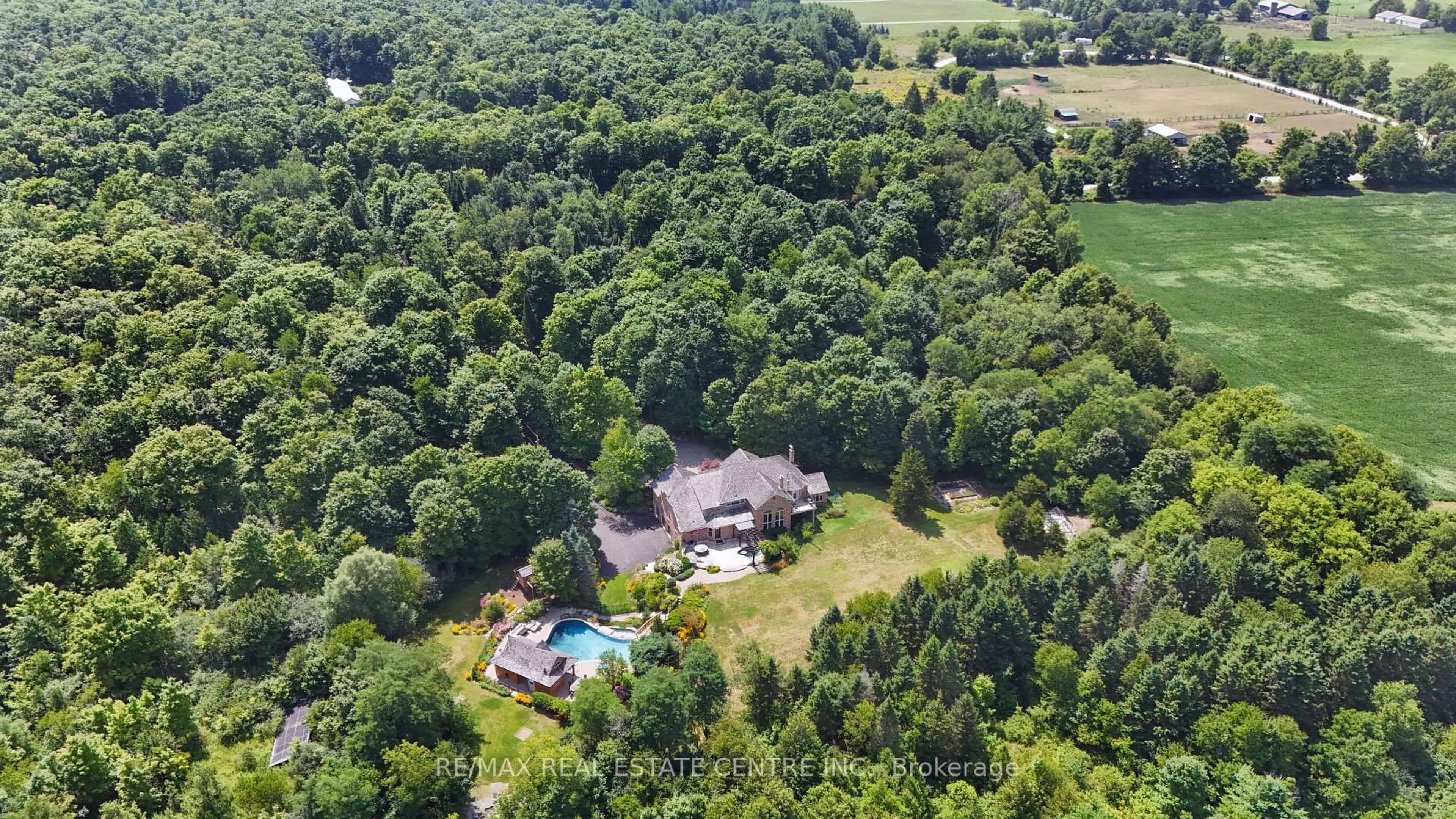 A pic from outside/outdoor area/front of a property/back of a property/a pic from drone, forest/trees view for 13701 4th Nassagaweya Line, Milton Ontario N0B 2K0