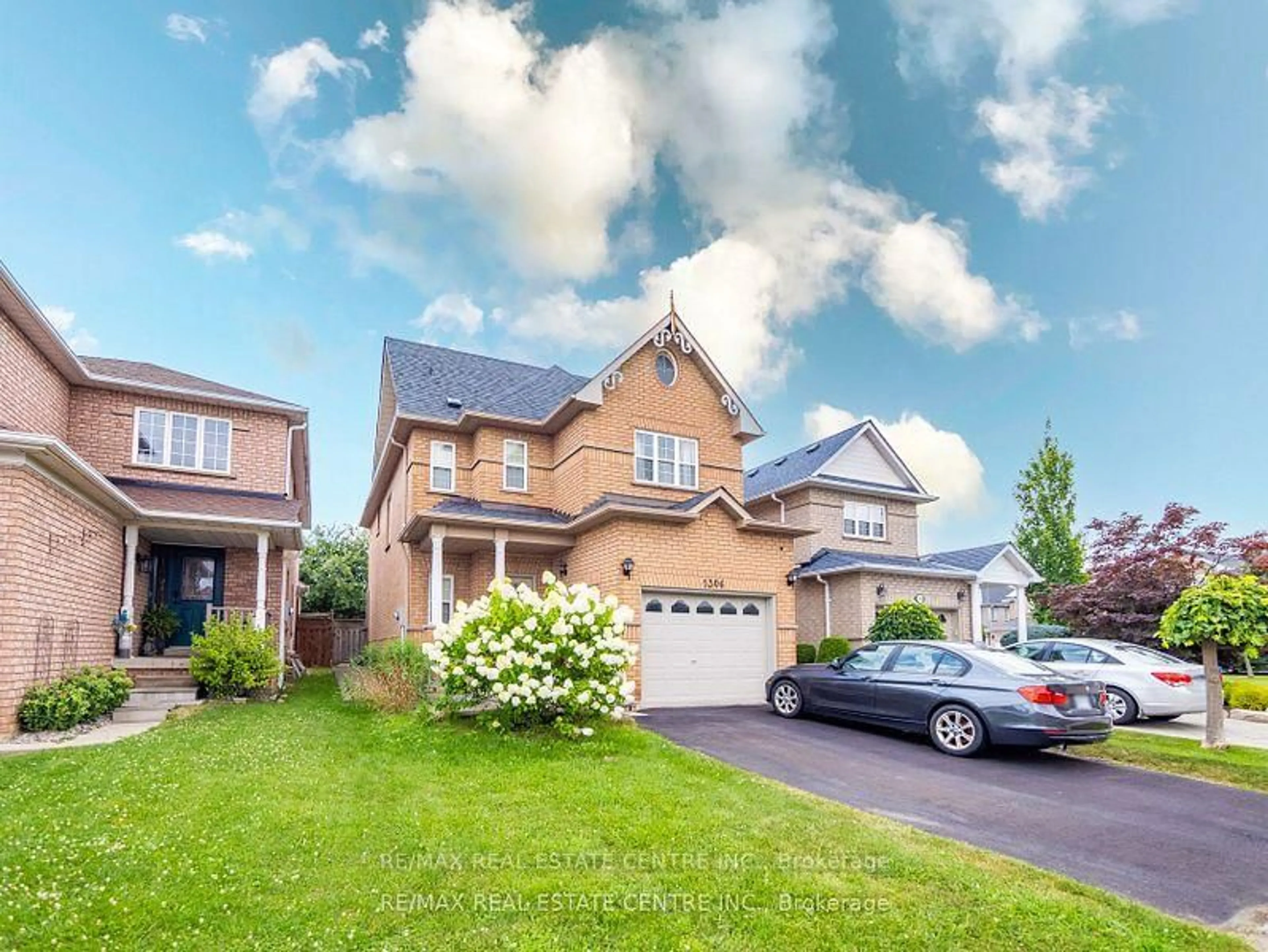 Home with brick exterior material, street for 1306 Sandpiper Rd, Oakville Ontario L6M 3V7