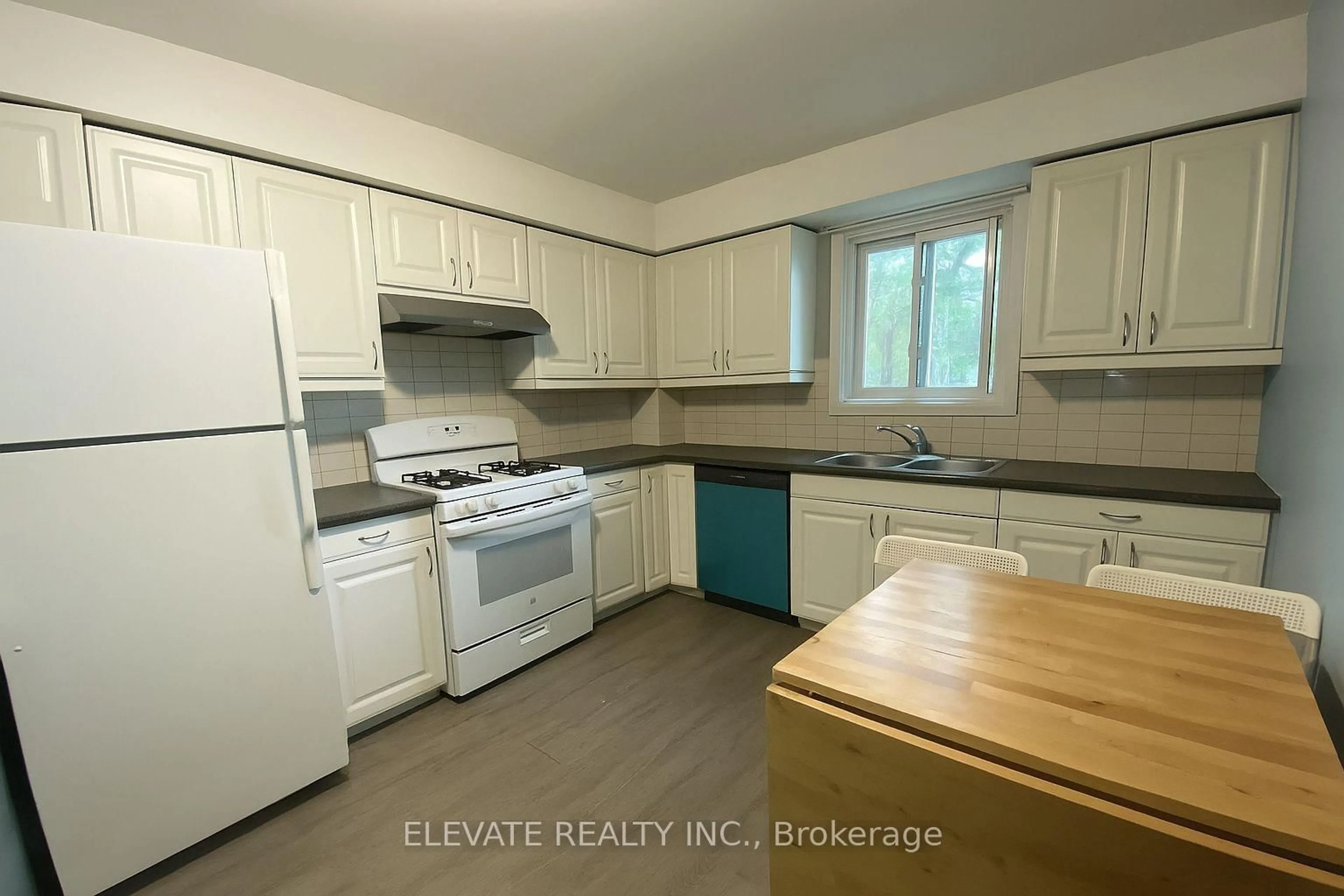 Standard kitchen, wood/laminate floor for 515 Salem Ave, Toronto Ontario M6H 3C9