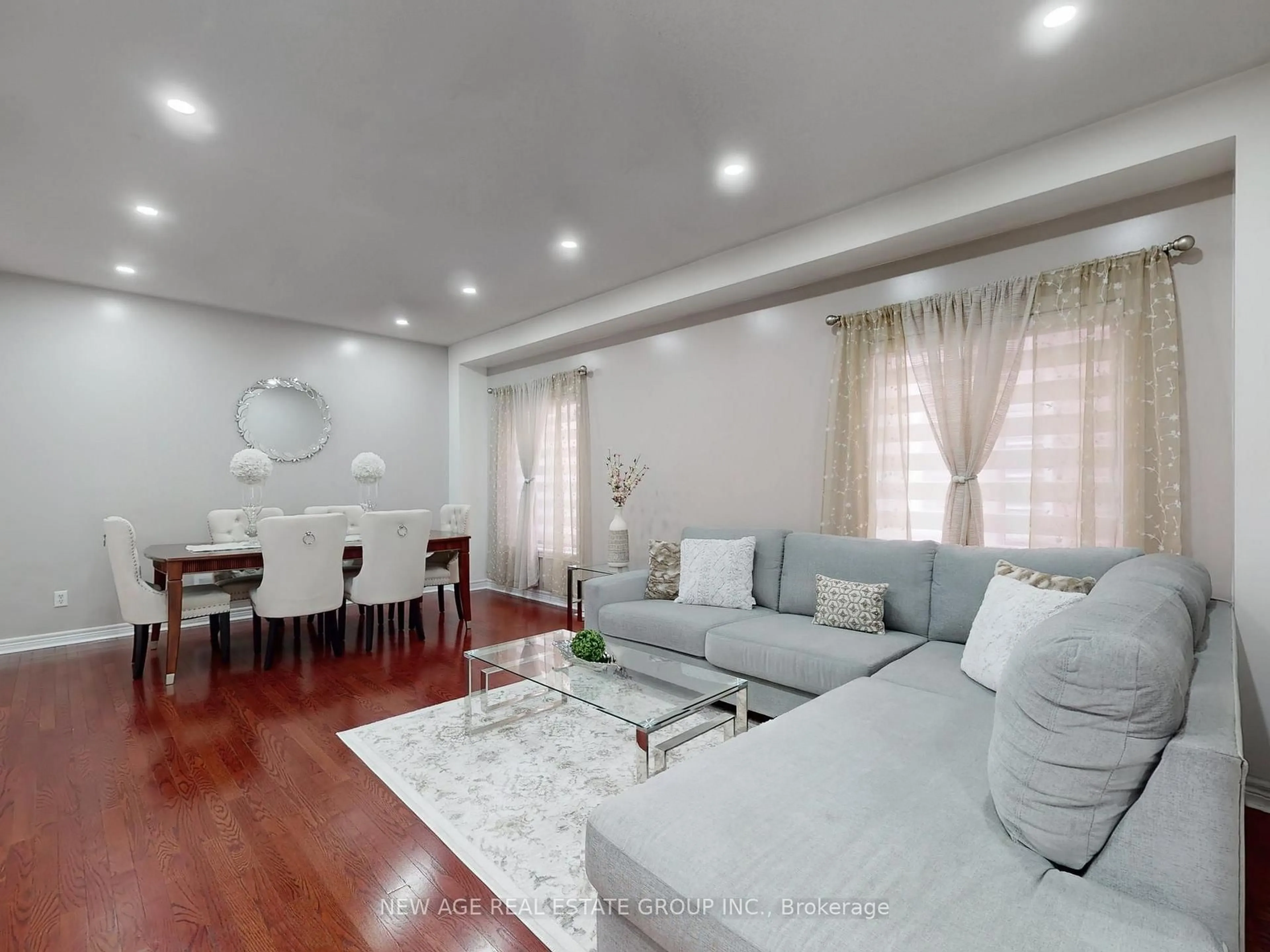Living room with furniture, wood/laminate floor for 43 Tatra Cres, Brampton Ontario L6Y 0K6