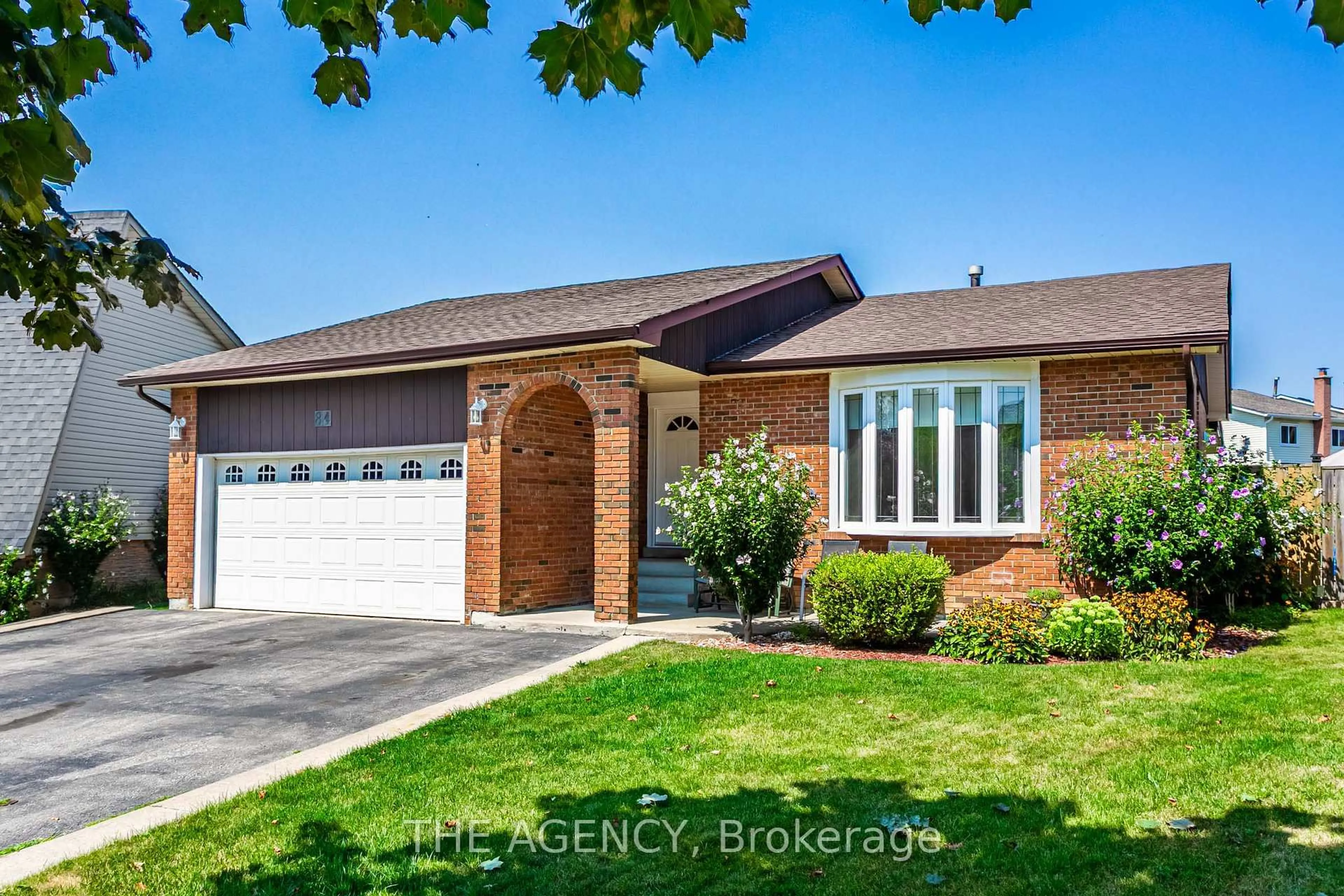 Home with brick exterior material, street for 84 Blackthorn Lane, Brampton Ontario L6V 3K8