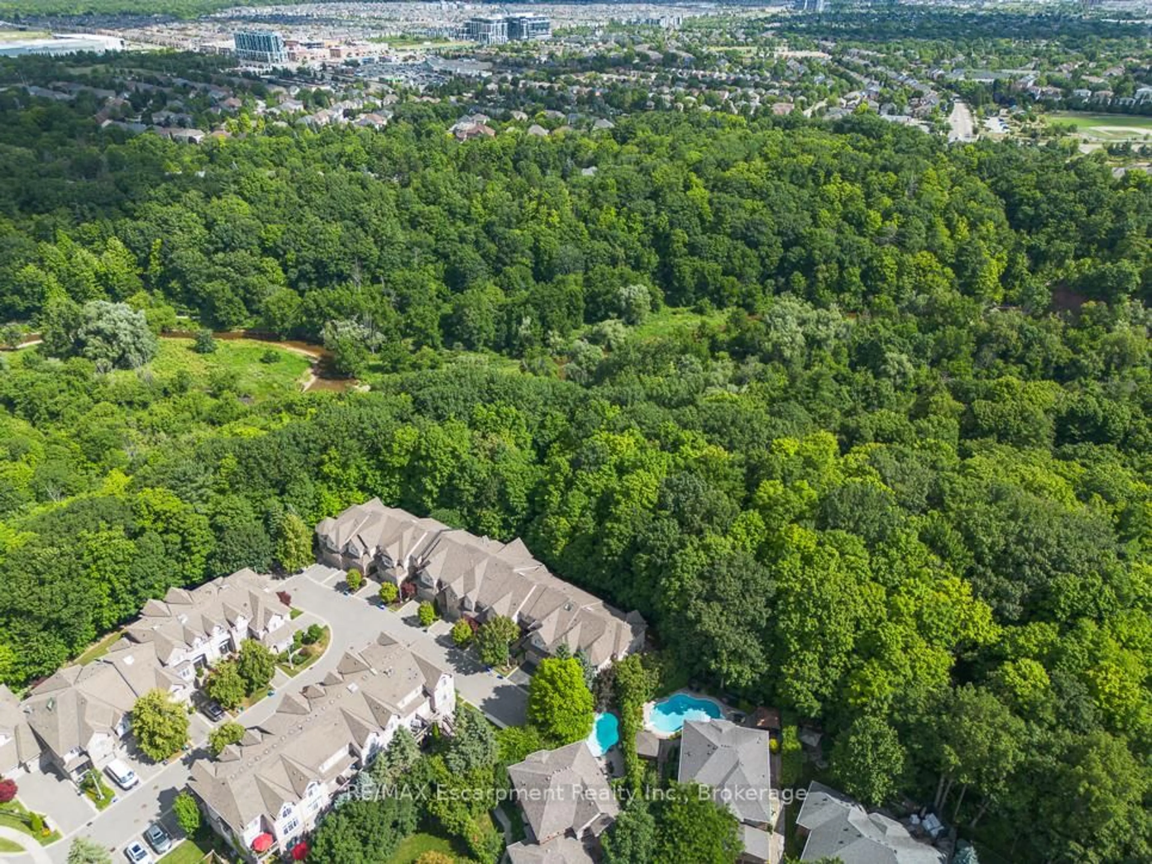 A pic from outside/outdoor area/front of a property/back of a property/a pic from drone, forest/trees view for 2303 HILL RIDGE Crt #16, Oakville Ontario L6M 3N3