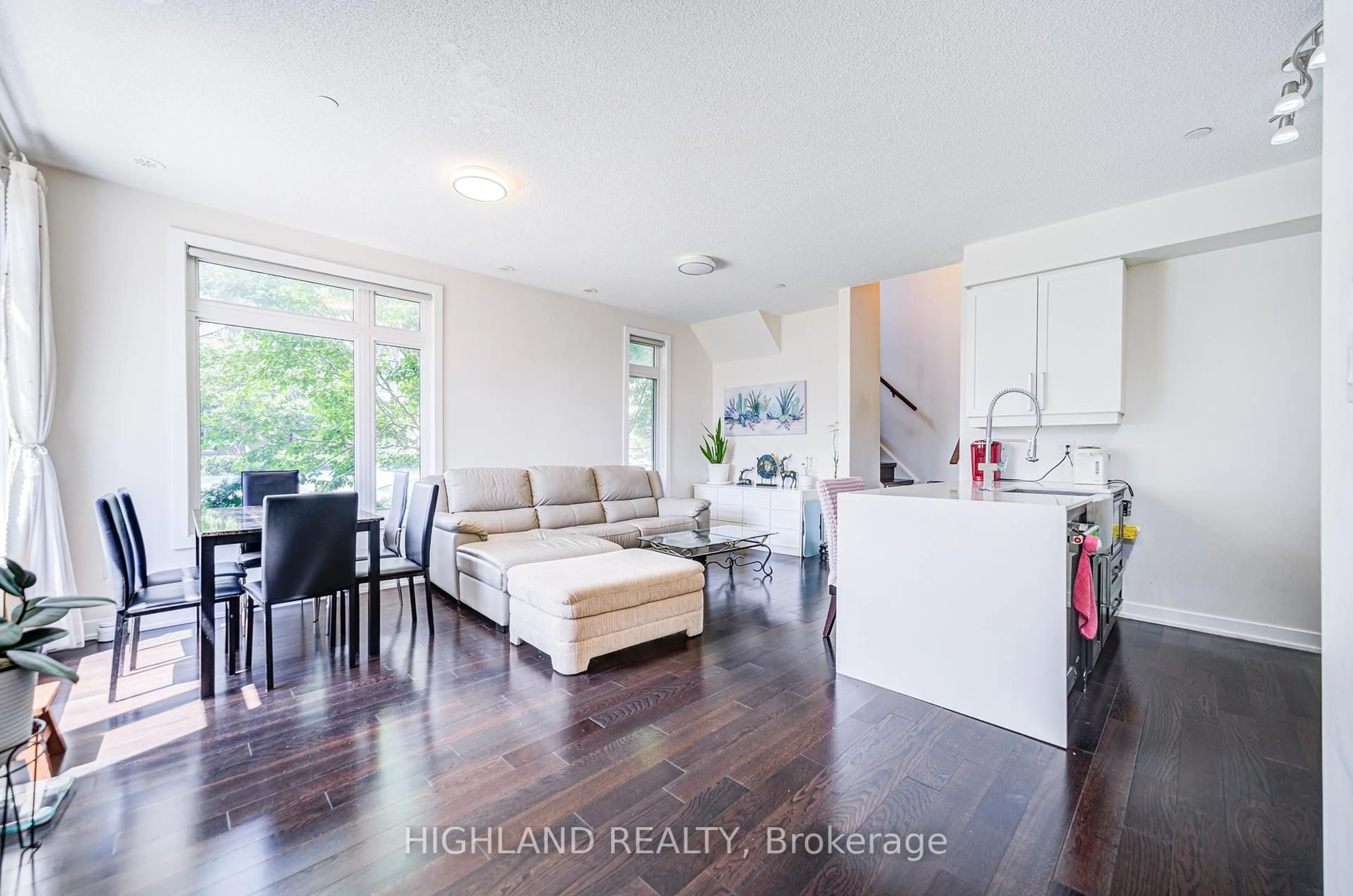 Open concept kitchen, wood/laminate floor for 4030 Parkside Village Dr #7, Mississauga Ontario L5B 0K2