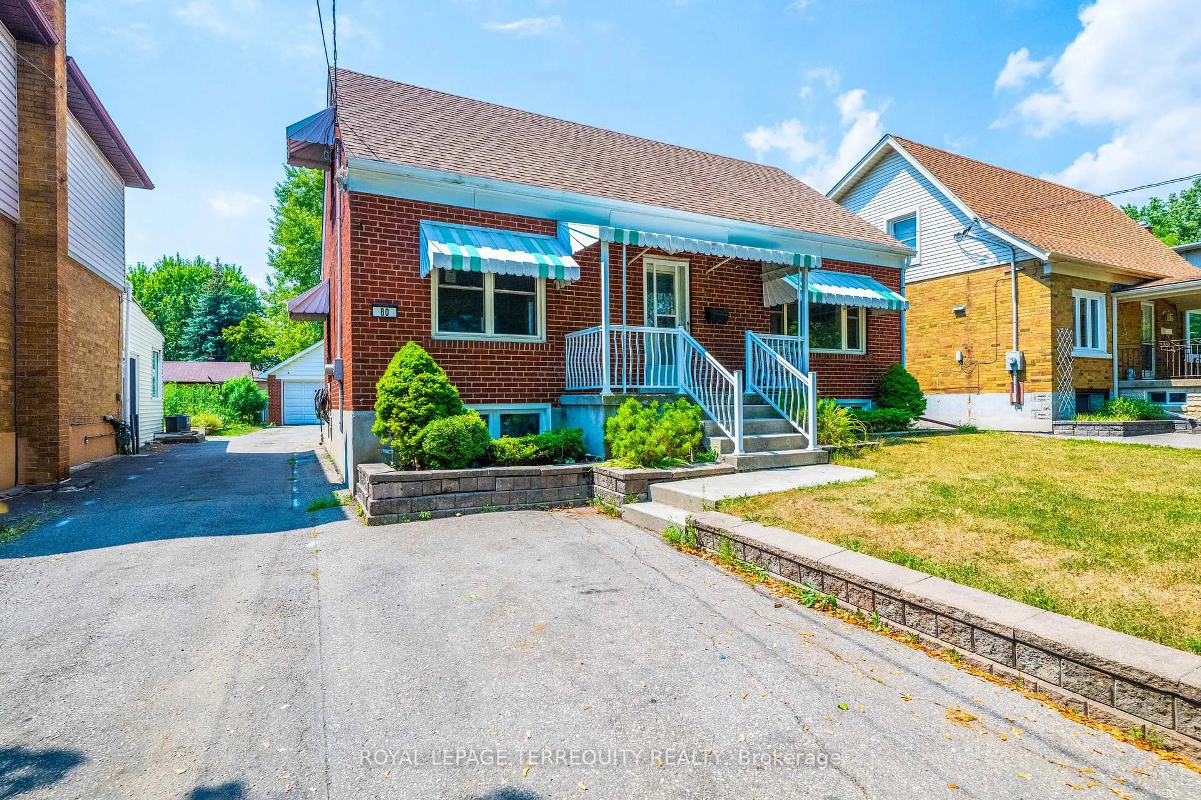 Home with brick exterior material, street for 80 Haymarket Rd, Toronto Ontario M3L 1H9