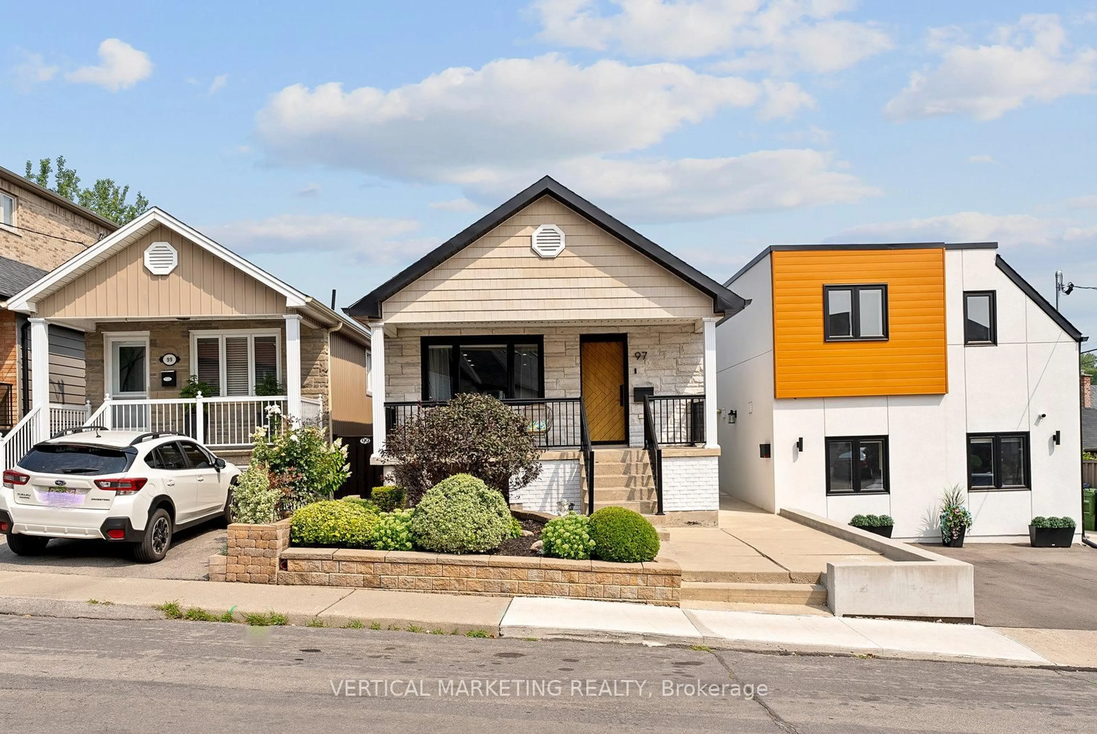 Home with vinyl exterior material, street for 97 Ennerdale Rd, Toronto Ontario M6E 4C7