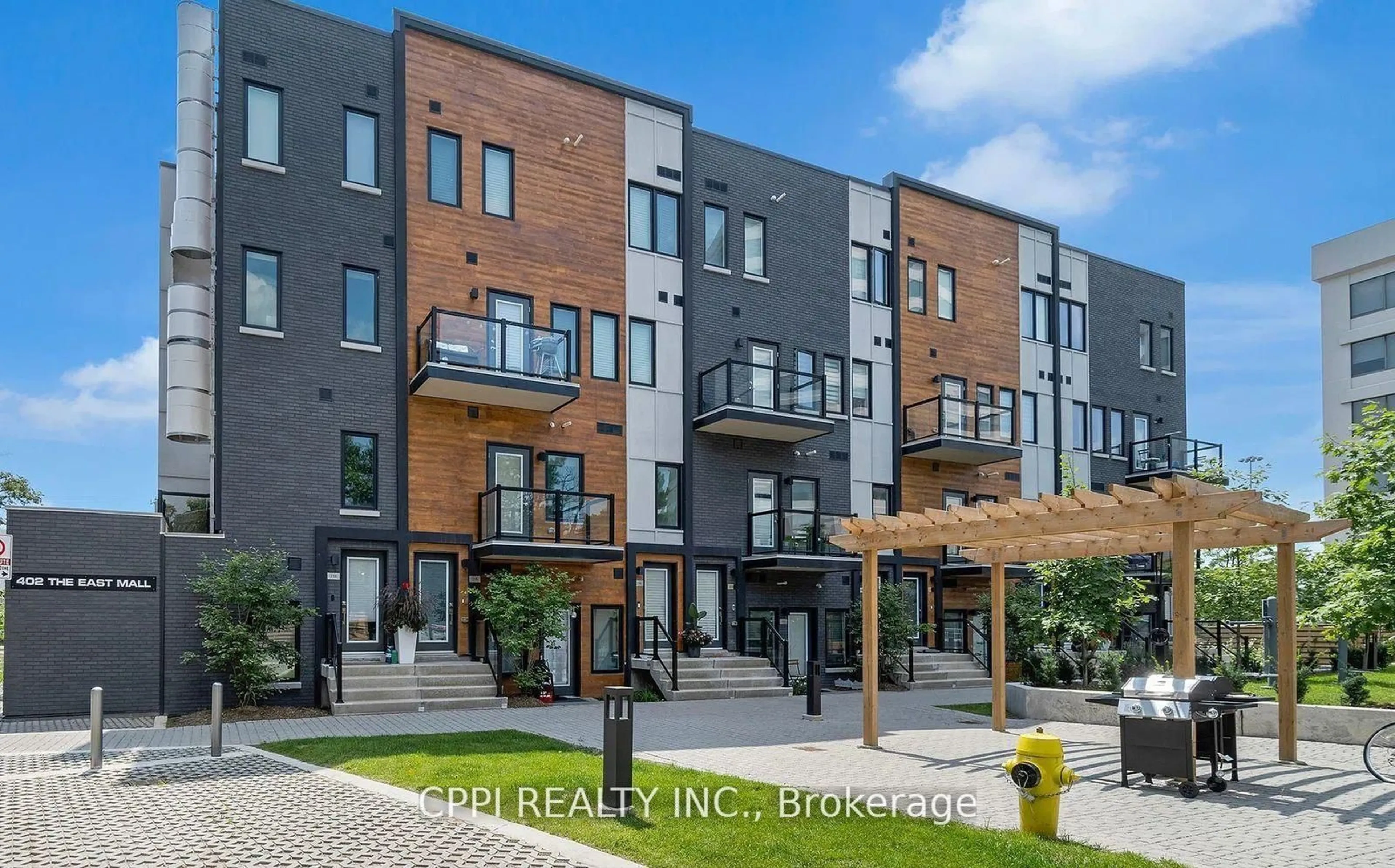 Home with brick exterior material, street for 402 The East Mall Dr #318, Toronto Ontario M9B 3Z9