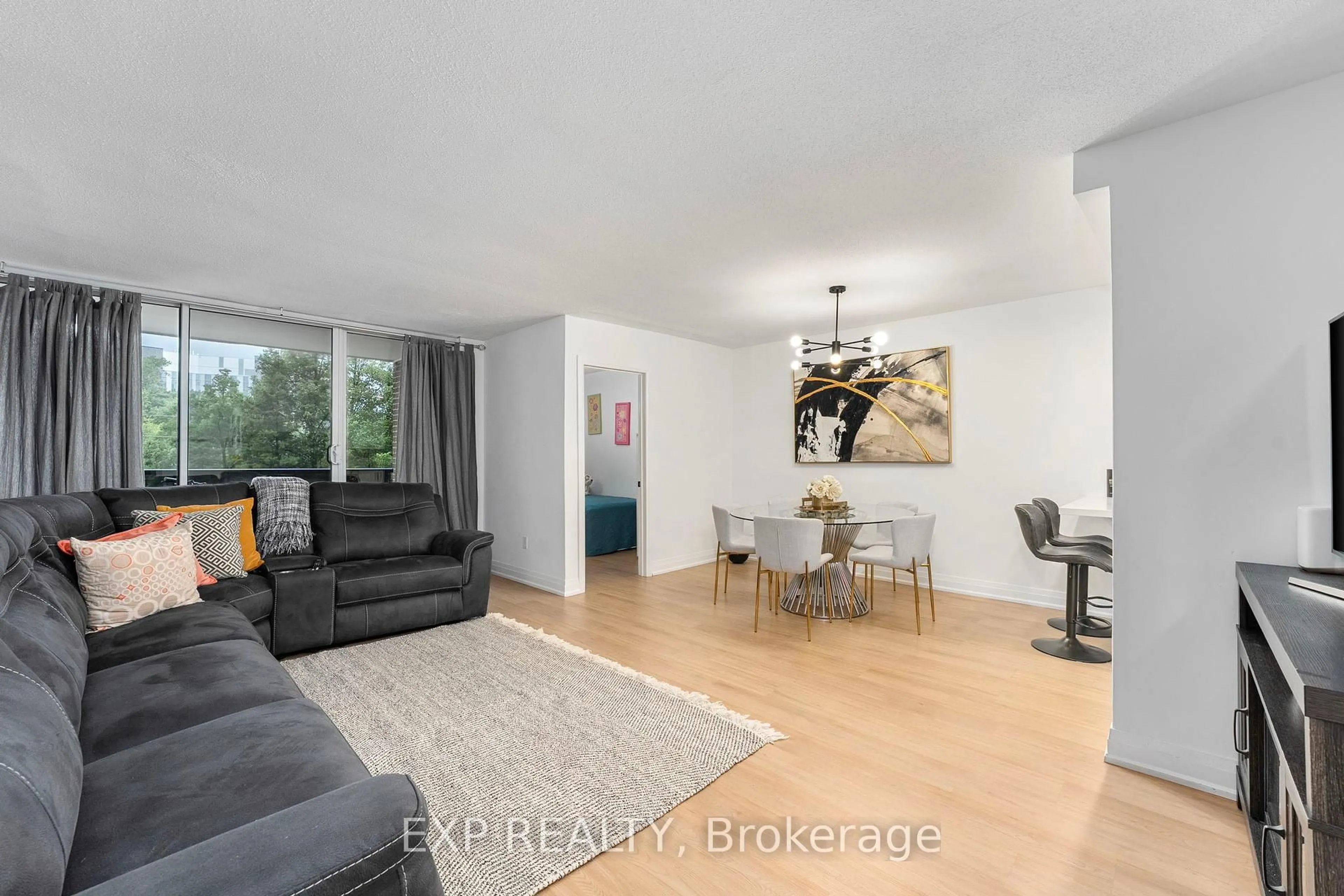 Living room with furniture, unknown for 85 Emmett Ave #312, Toronto Ontario M6M 5A2