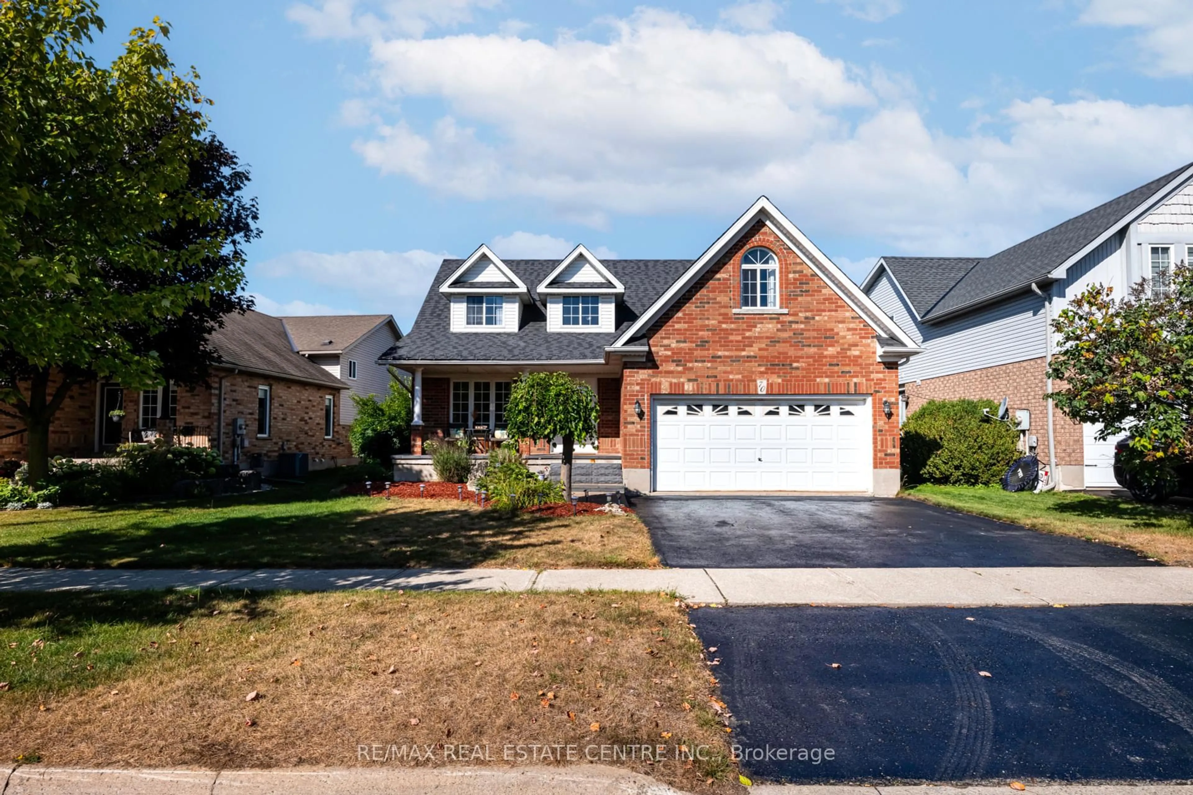 Home with brick exterior material, street for 70 Hunter Rd, Orangeville Ontario L9W 5C5