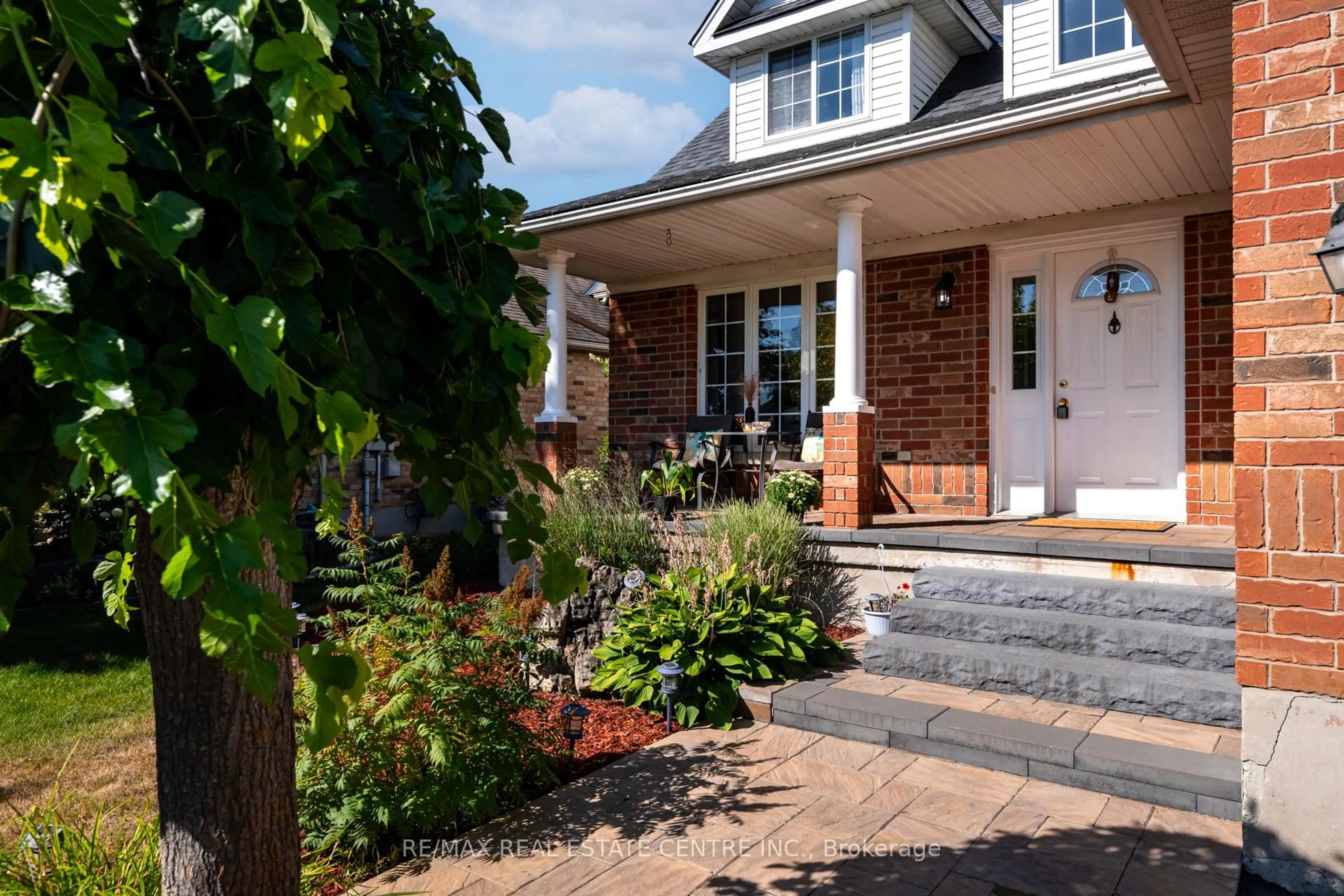Home with brick exterior material, street for 70 Hunter Rd, Orangeville Ontario L9W 5C5