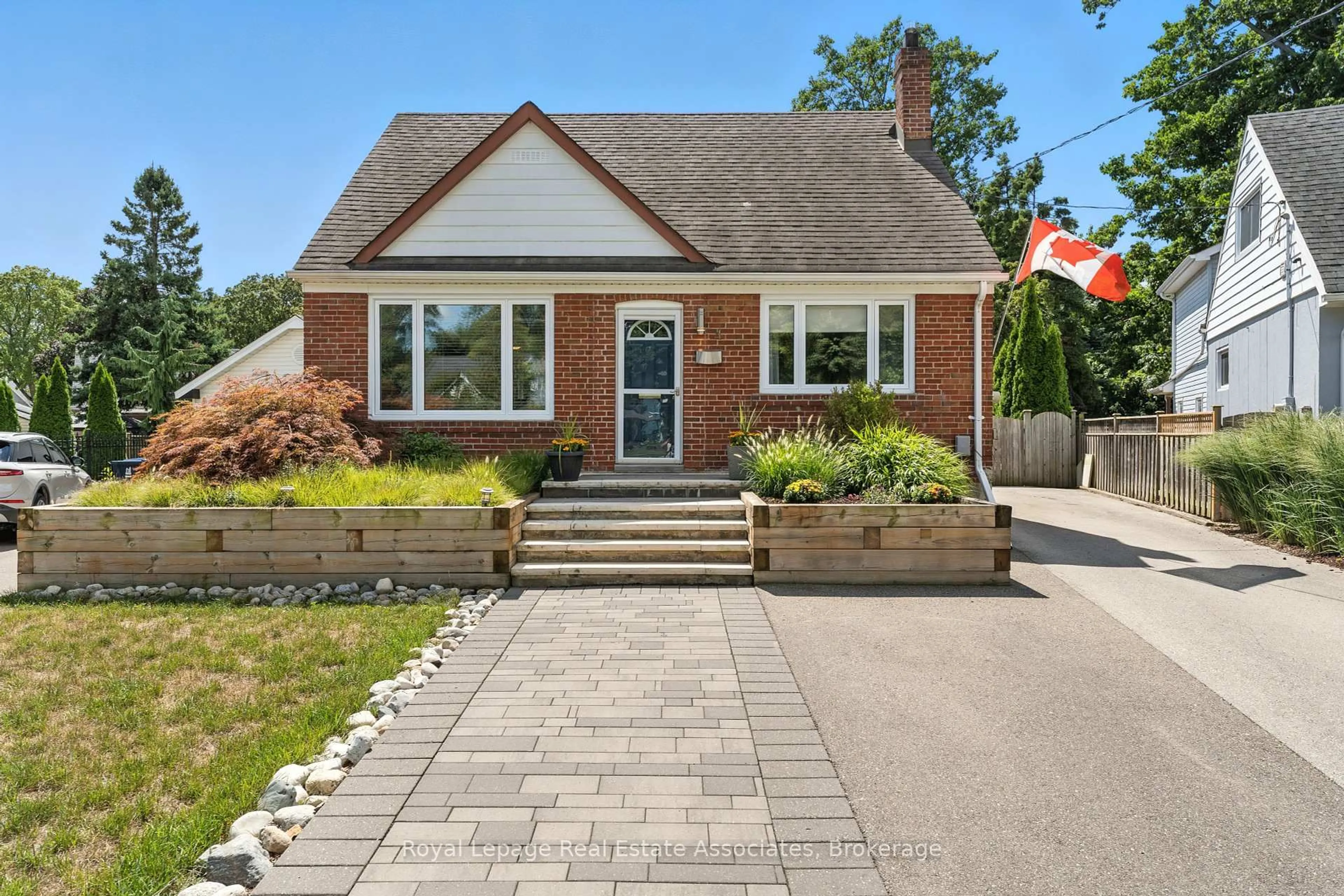 Home with brick exterior material, street for 4 Fulham Dr, Toronto Ontario M8W 4S9