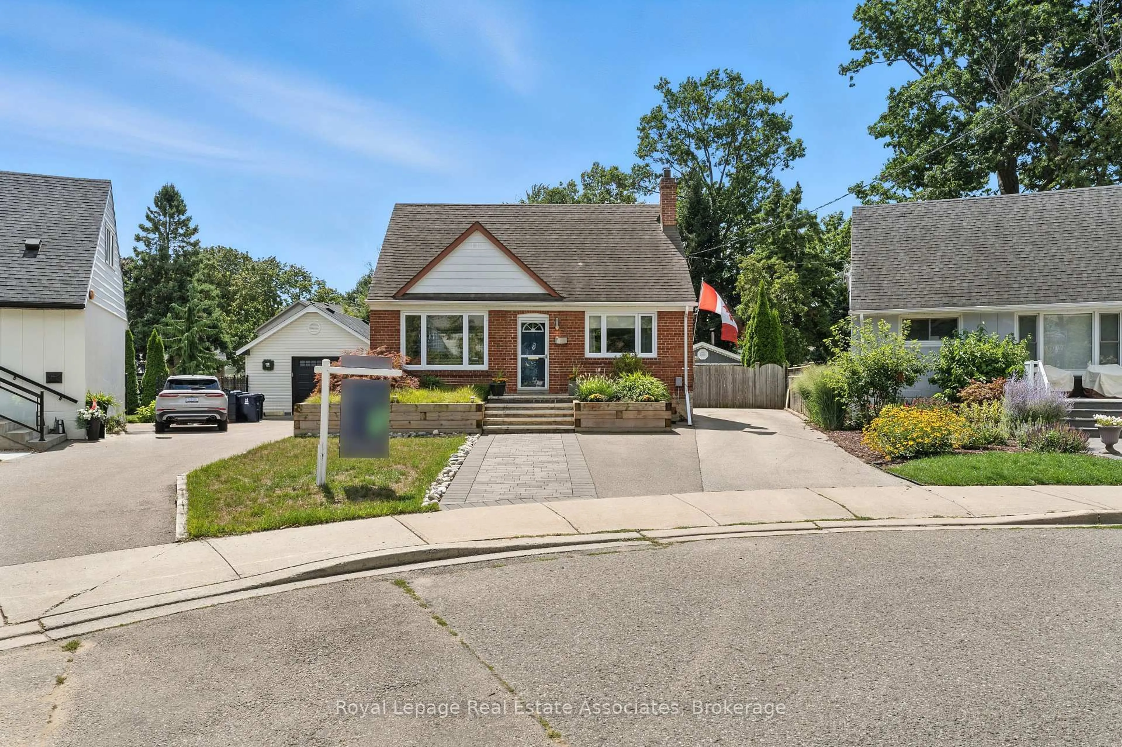 Home with brick exterior material, street for 4 Fulham Dr, Toronto Ontario M8W 4S9