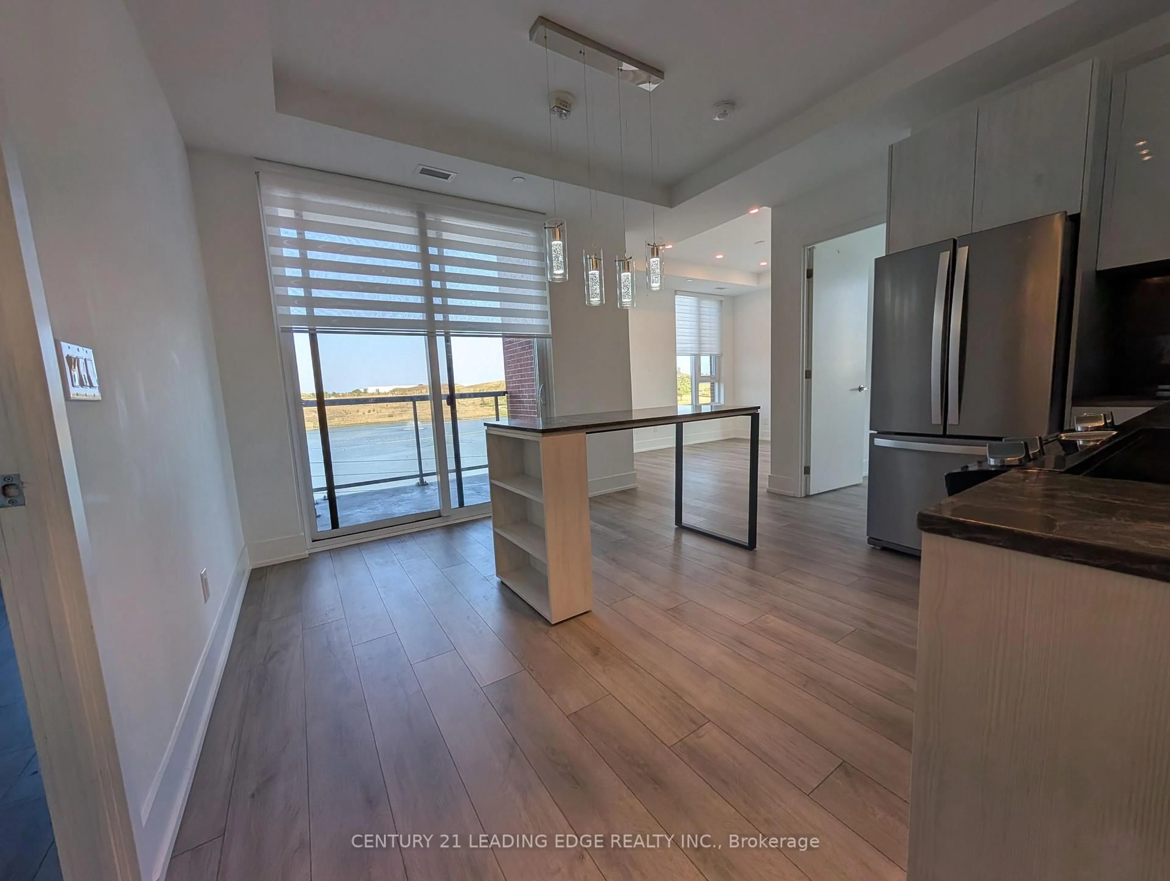 Open concept kitchen, wood/laminate floor for 3100 Keele St #525, Toronto Ontario M3M 2H4