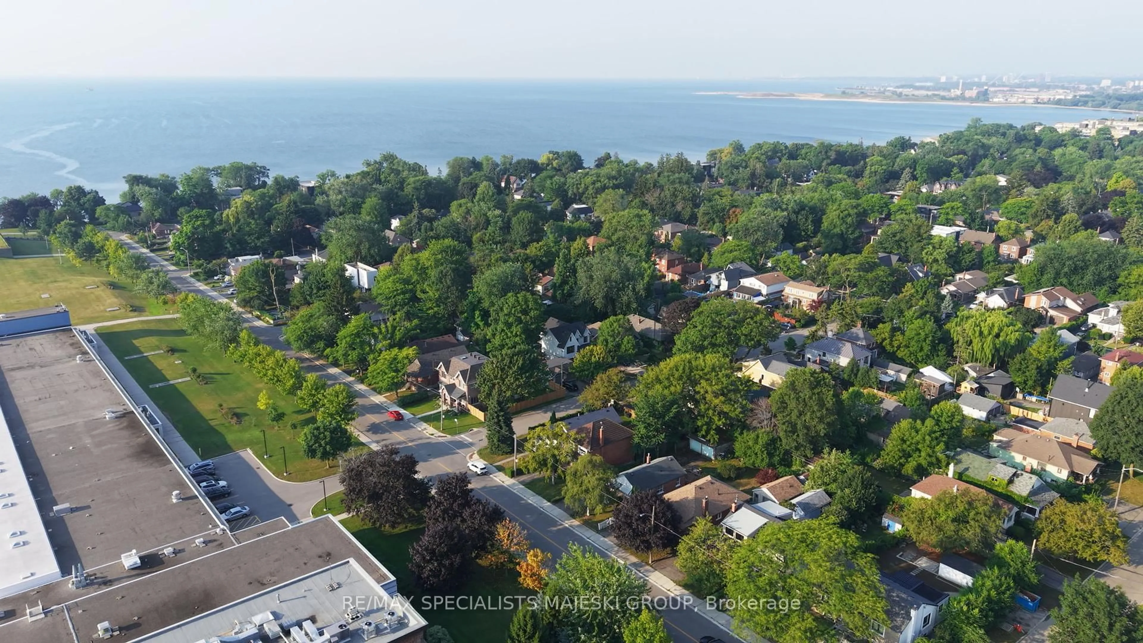 A pic from outside/outdoor area/front of a property/back of a property/a pic from drone, water/lake/river/ocean view for 50 Twenty Third St, Toronto Ontario M8V 3M6