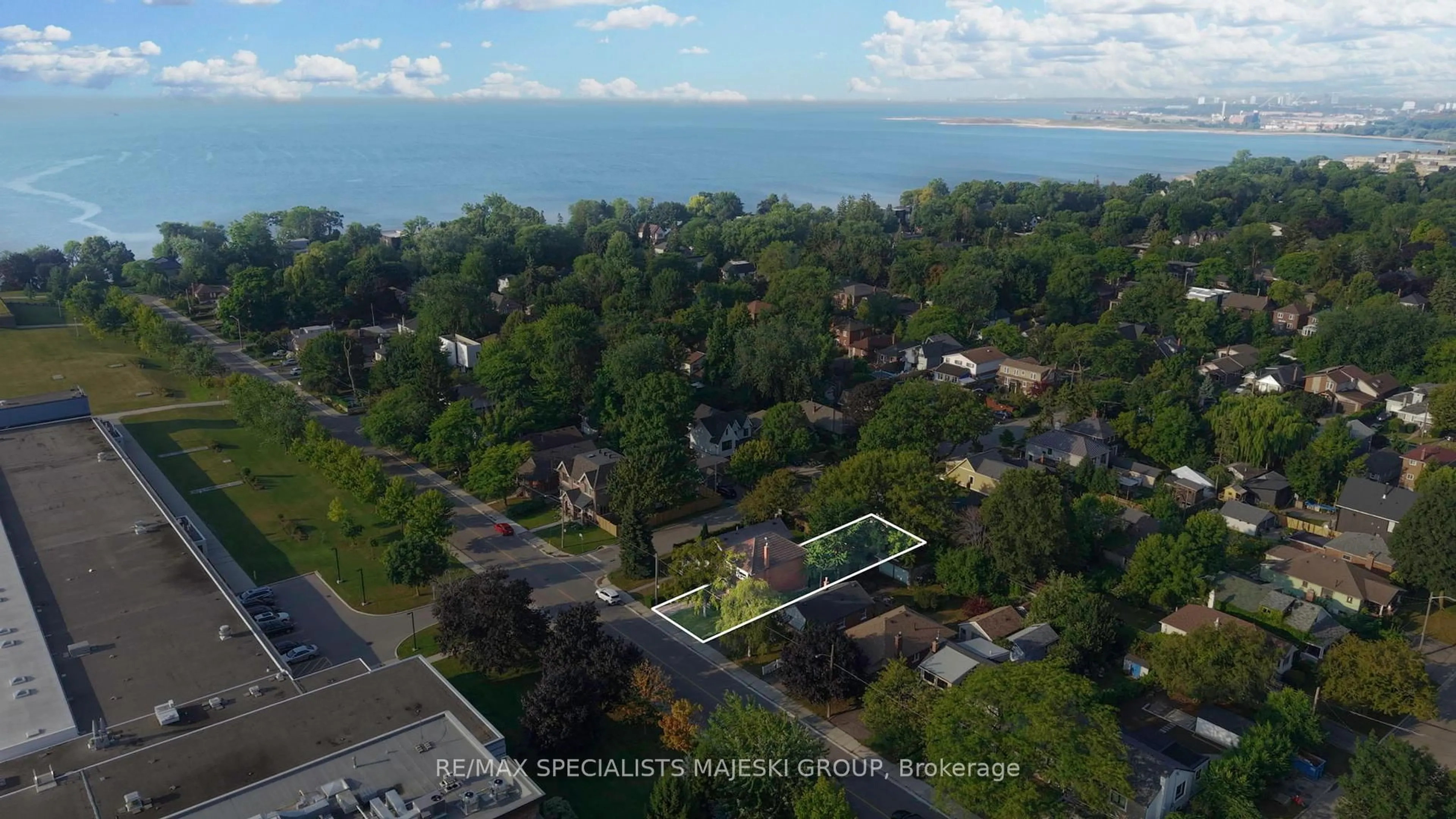 A pic from outside/outdoor area/front of a property/back of a property/a pic from drone, water/lake/river/ocean view for 50 Twenty Third St, Toronto Ontario M8V 3M6