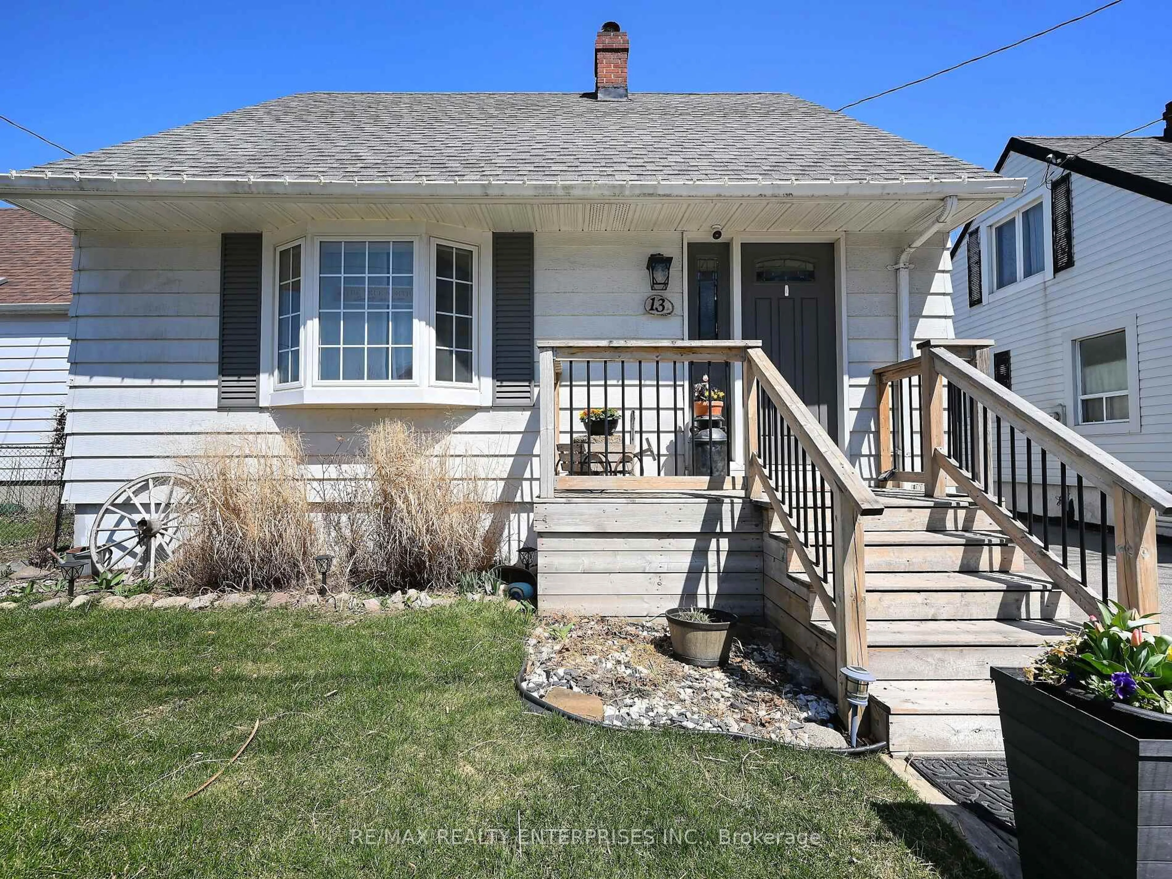Home with vinyl exterior material, street for 13 Avon Park Dr, Toronto Ontario M8Z 3X3