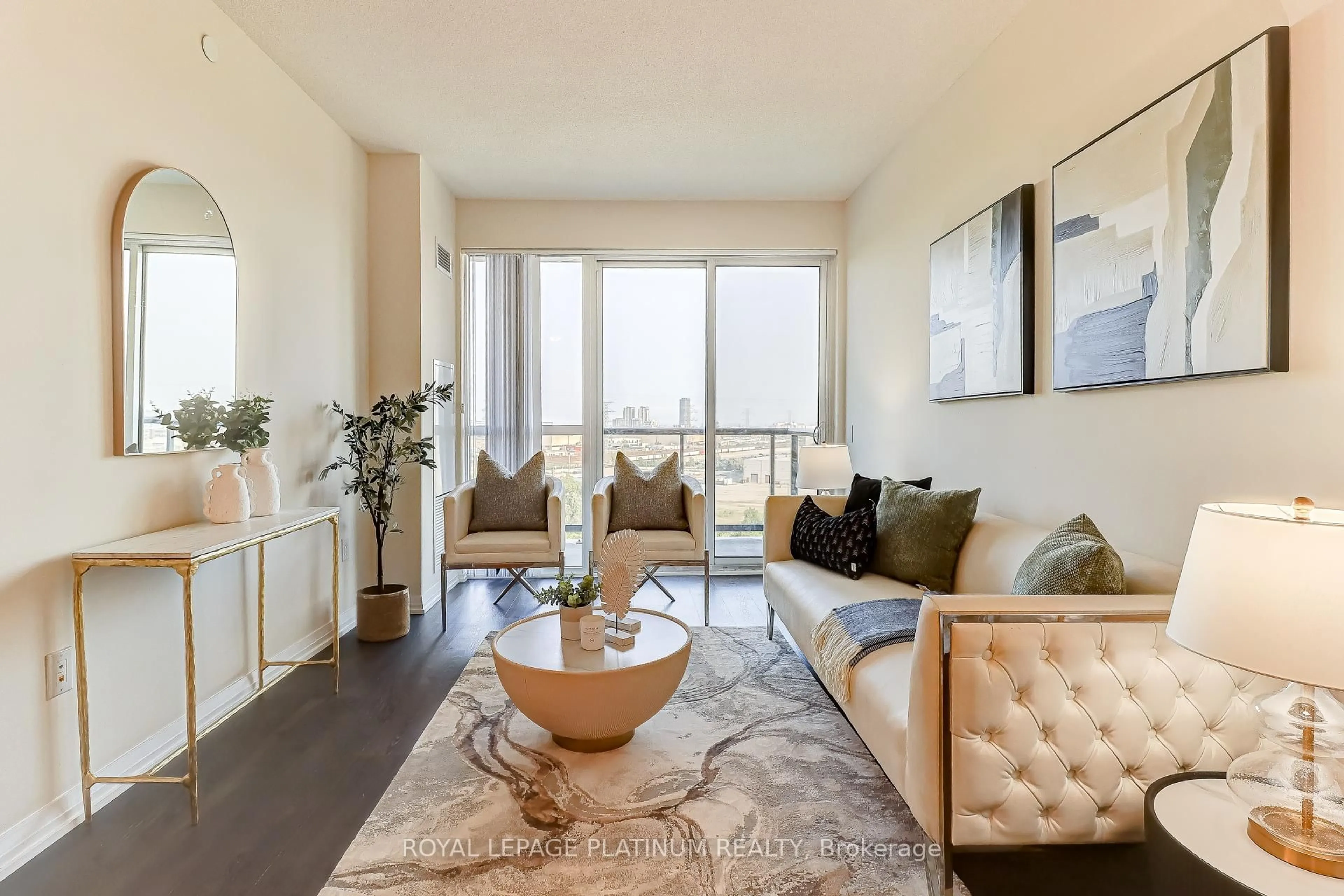 Living room with furniture, unknown for 50 Thomas Riley Rd #703, Toronto Ontario M9B 0C5