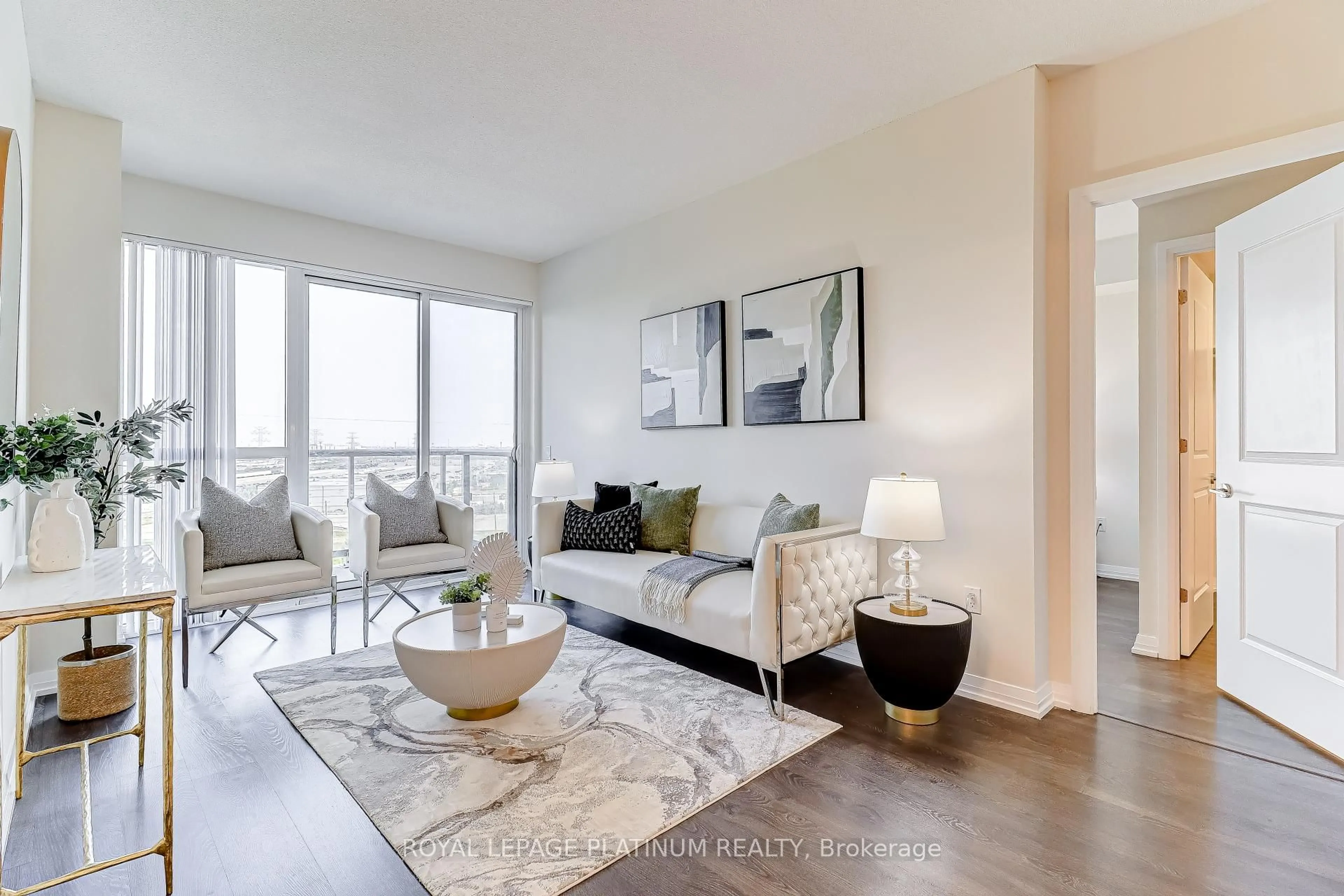 Living room with furniture, unknown for 50 Thomas Riley Rd #703, Toronto Ontario M9B 0C5