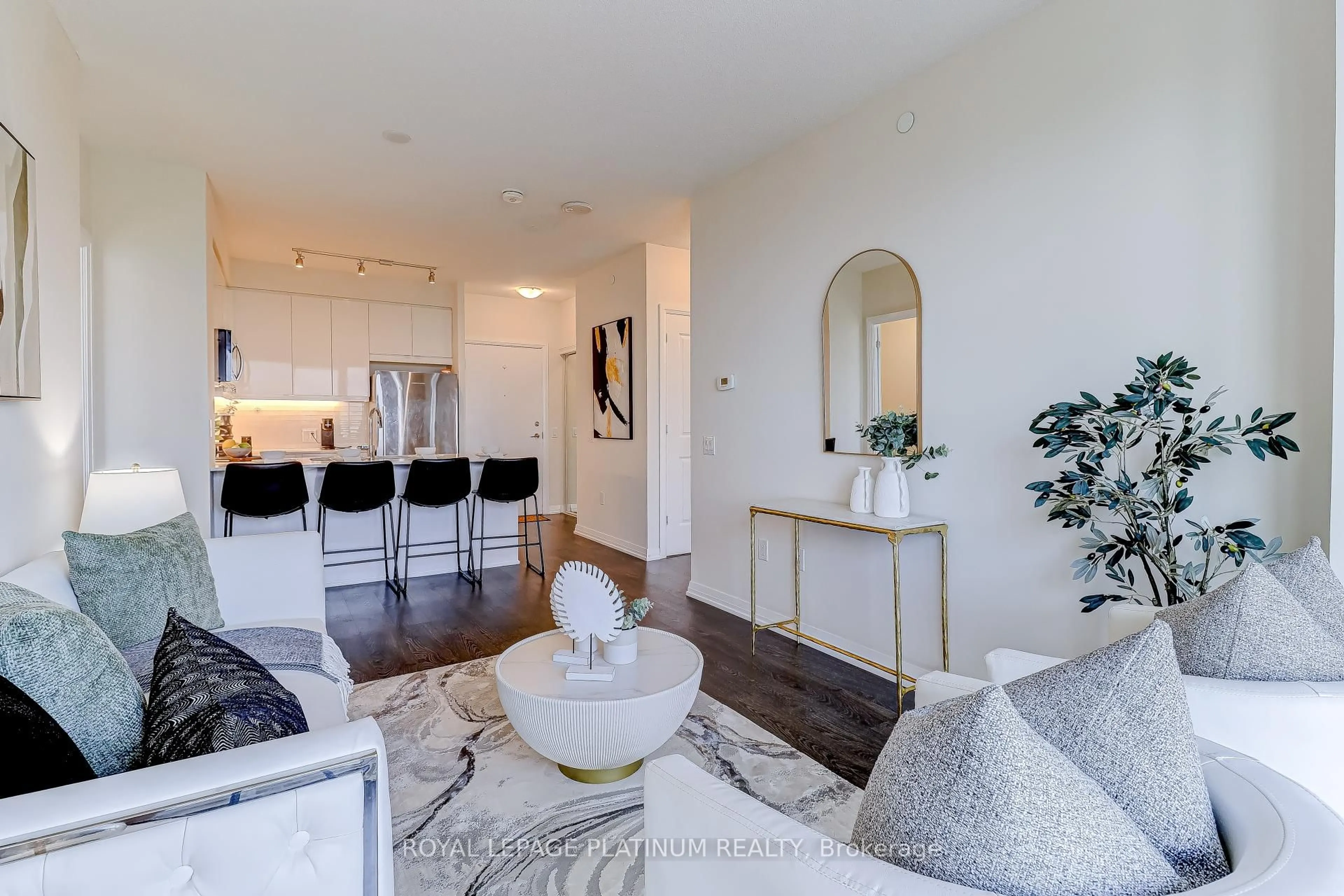 Living room with furniture, unknown for 50 Thomas Riley Rd #703, Toronto Ontario M9B 0C5