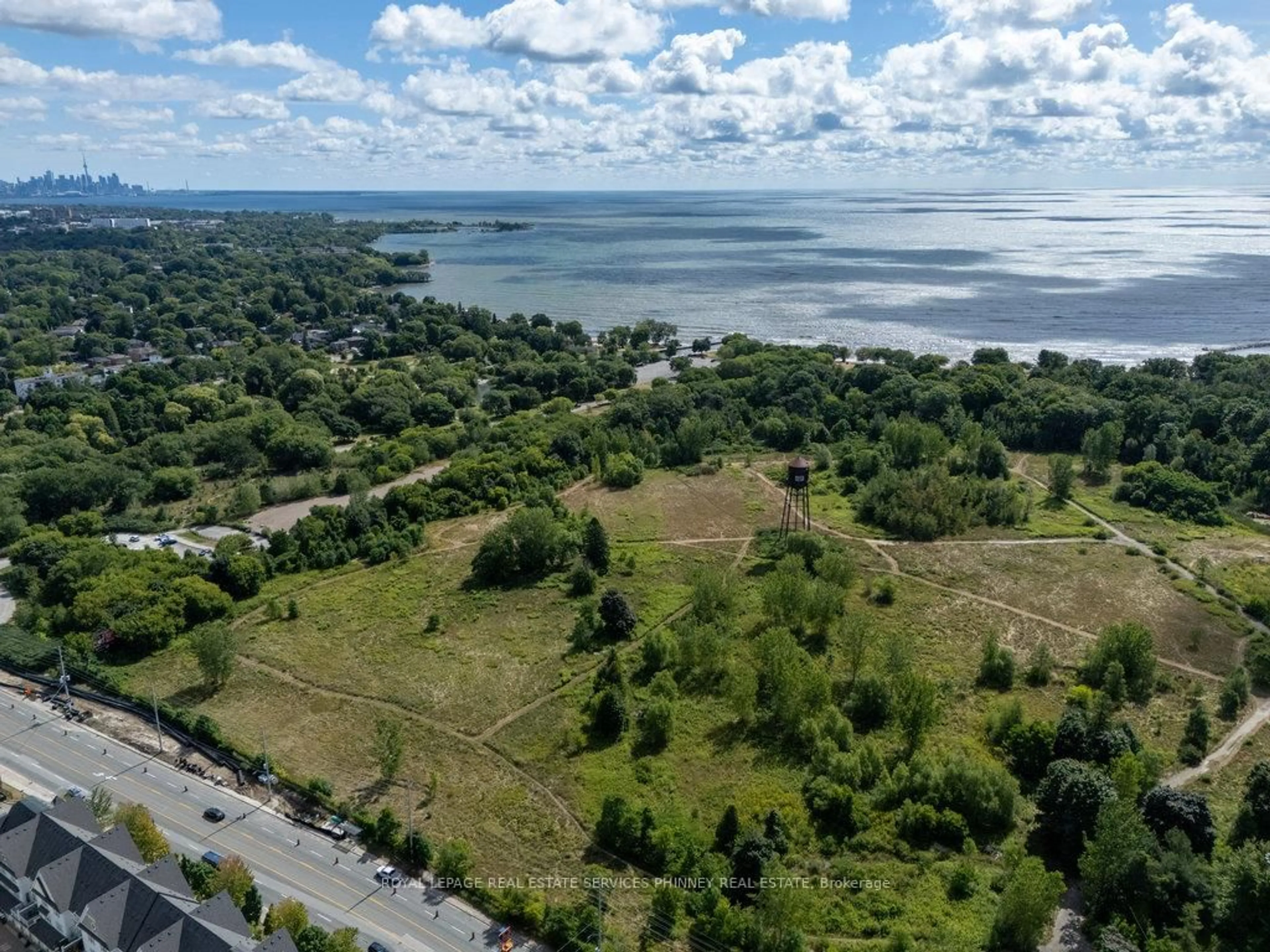 A pic from outside/outdoor area/front of a property/back of a property/a pic from drone, water/lake/river/ocean view for 1088 Cherriebell Rd, Mississauga Ontario L5E 2R3