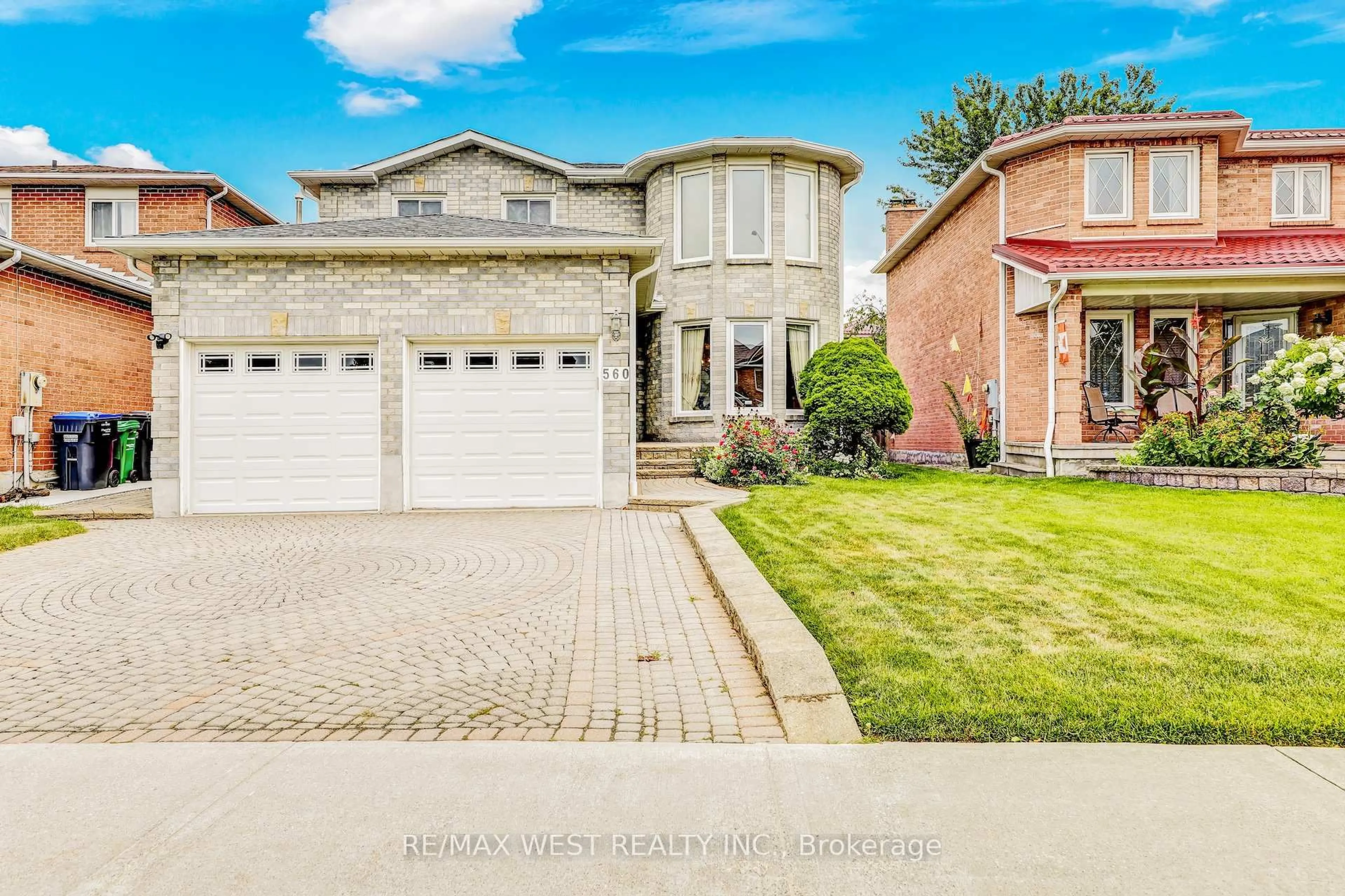 Home with brick exterior material, street for 560 Ceremonial Dr, Mississauga Ontario L5R 2T7