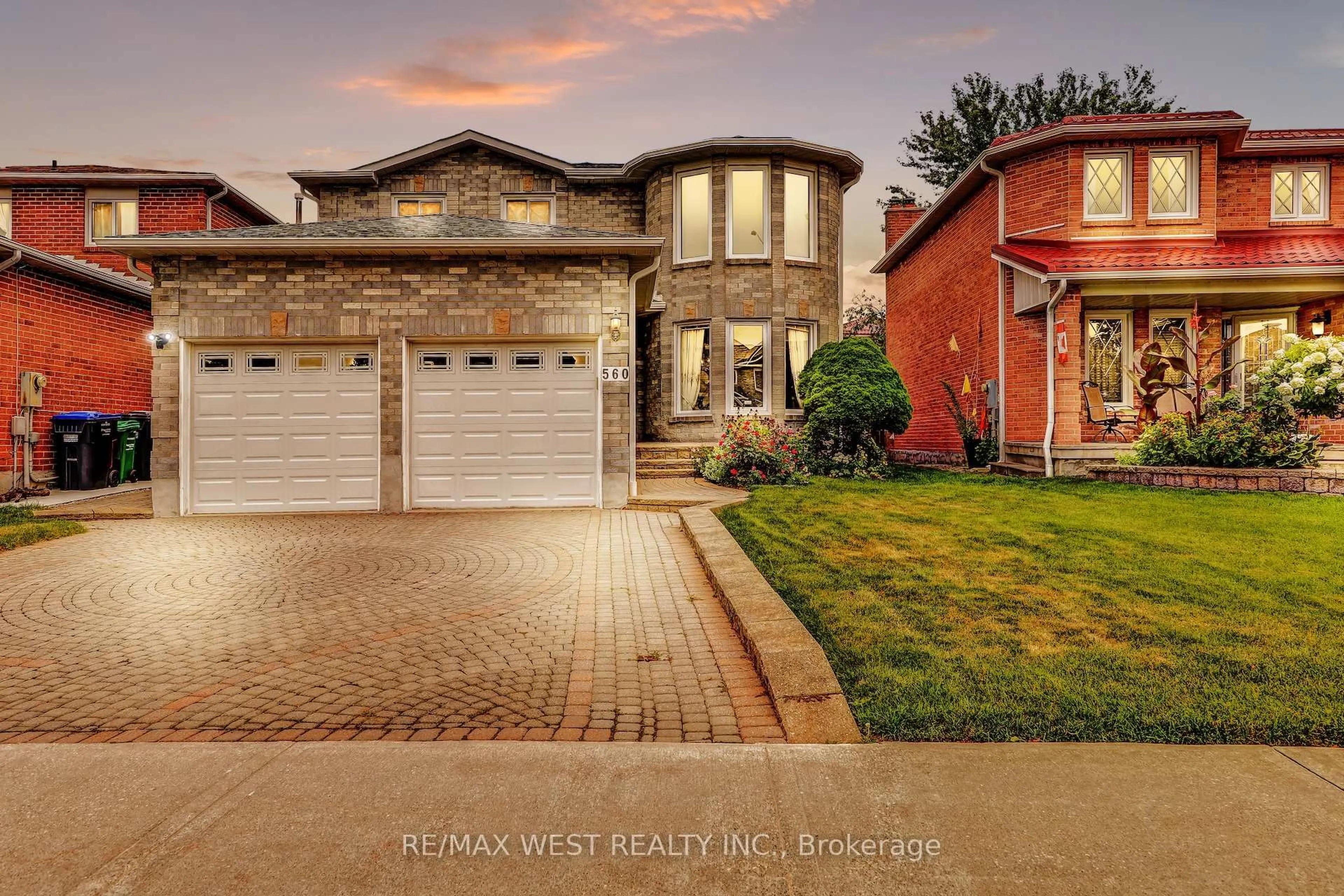 Home with brick exterior material, street for 560 Ceremonial Dr, Mississauga Ontario L5R 2T7