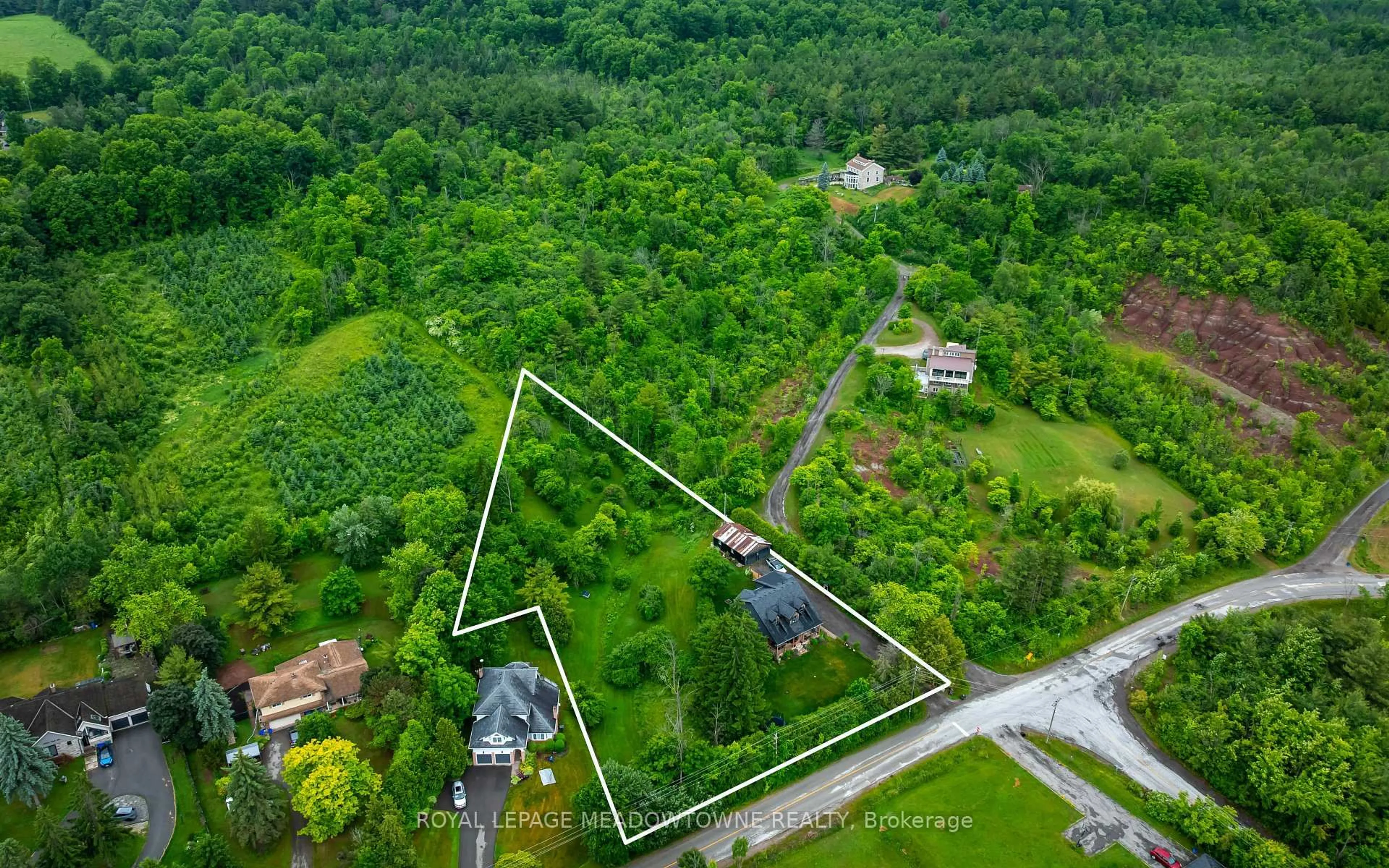 A pic from outside/outdoor area/front of a property/back of a property/a pic from drone, unknown for 13394 Tenth Line, Halton Hills Ontario L7G 4S8
