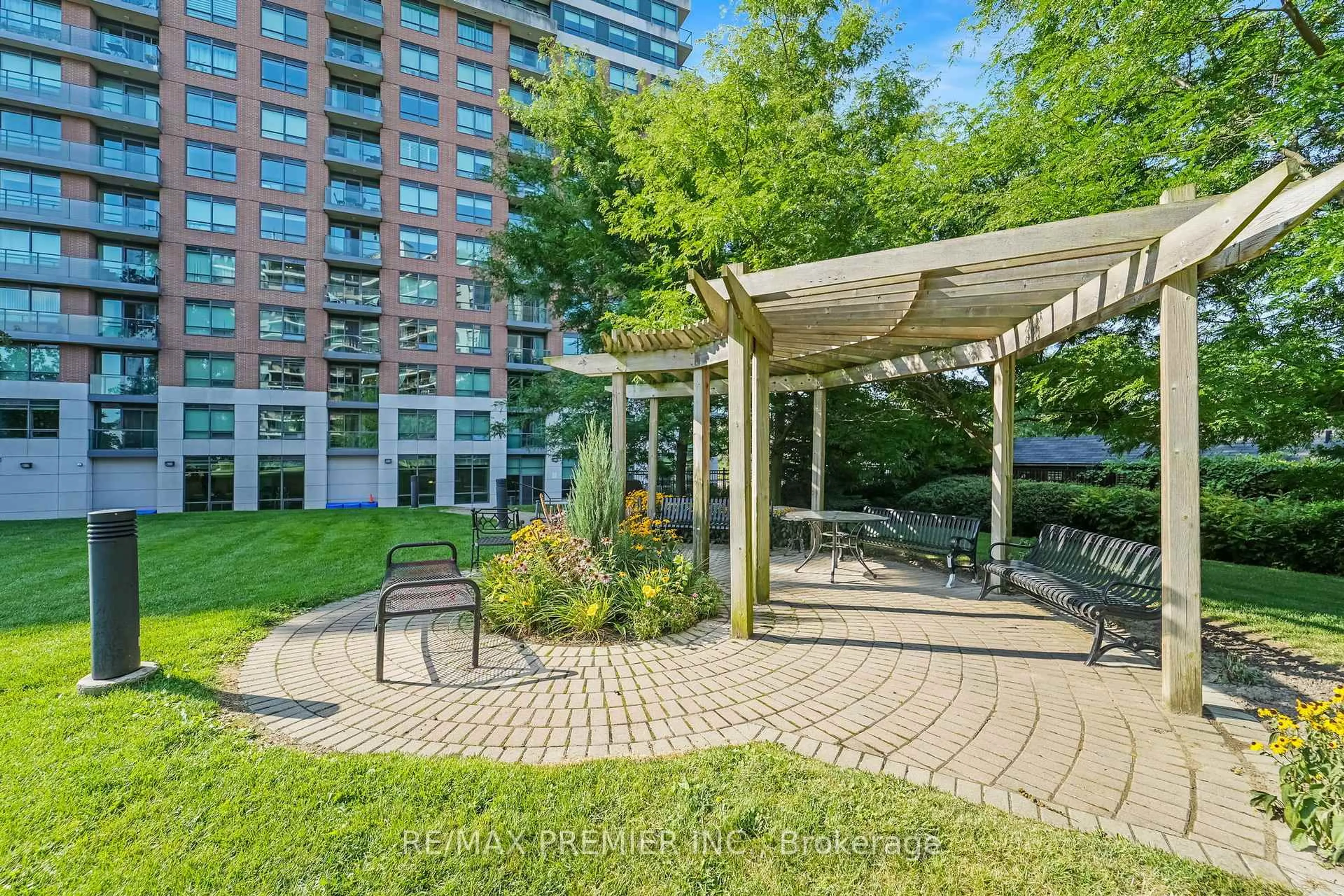 Patio, city buildings view from balcony for 1403 Royal York Rd #216, Toronto Ontario M9P 0A1