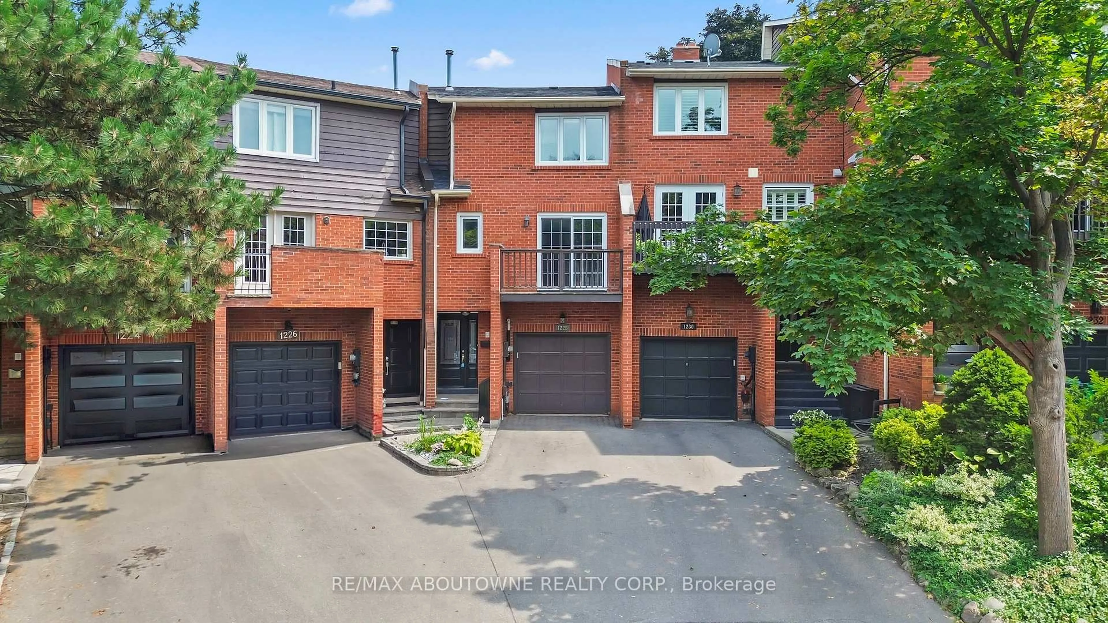 Home with brick exterior material, street for 1228 Cornerbrook Pl, Mississauga Ontario L5C 3J4