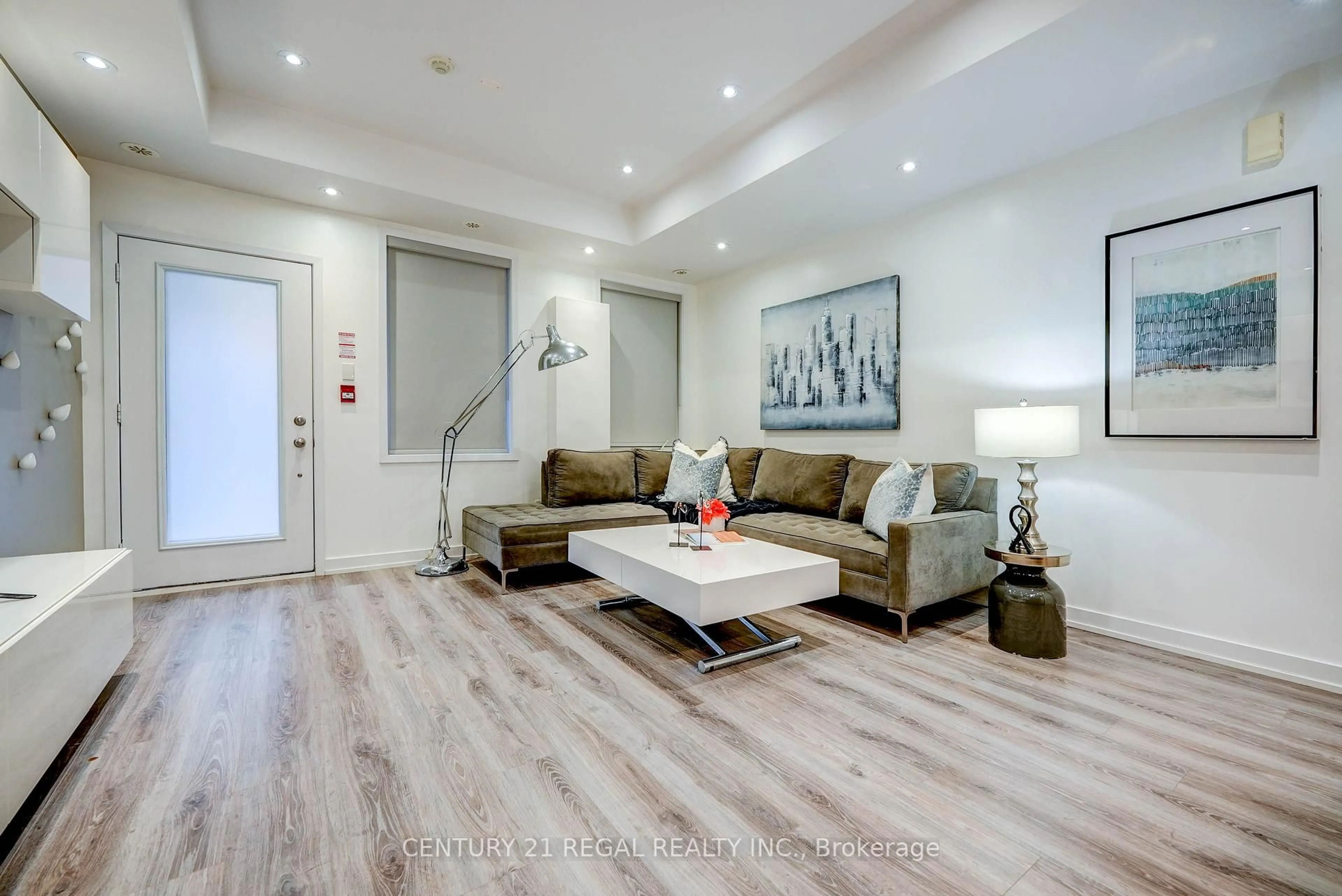 Living room with furniture, wood/laminate floor for 867 Wilson Ave #5B, Toronto Ontario M3K 0A4