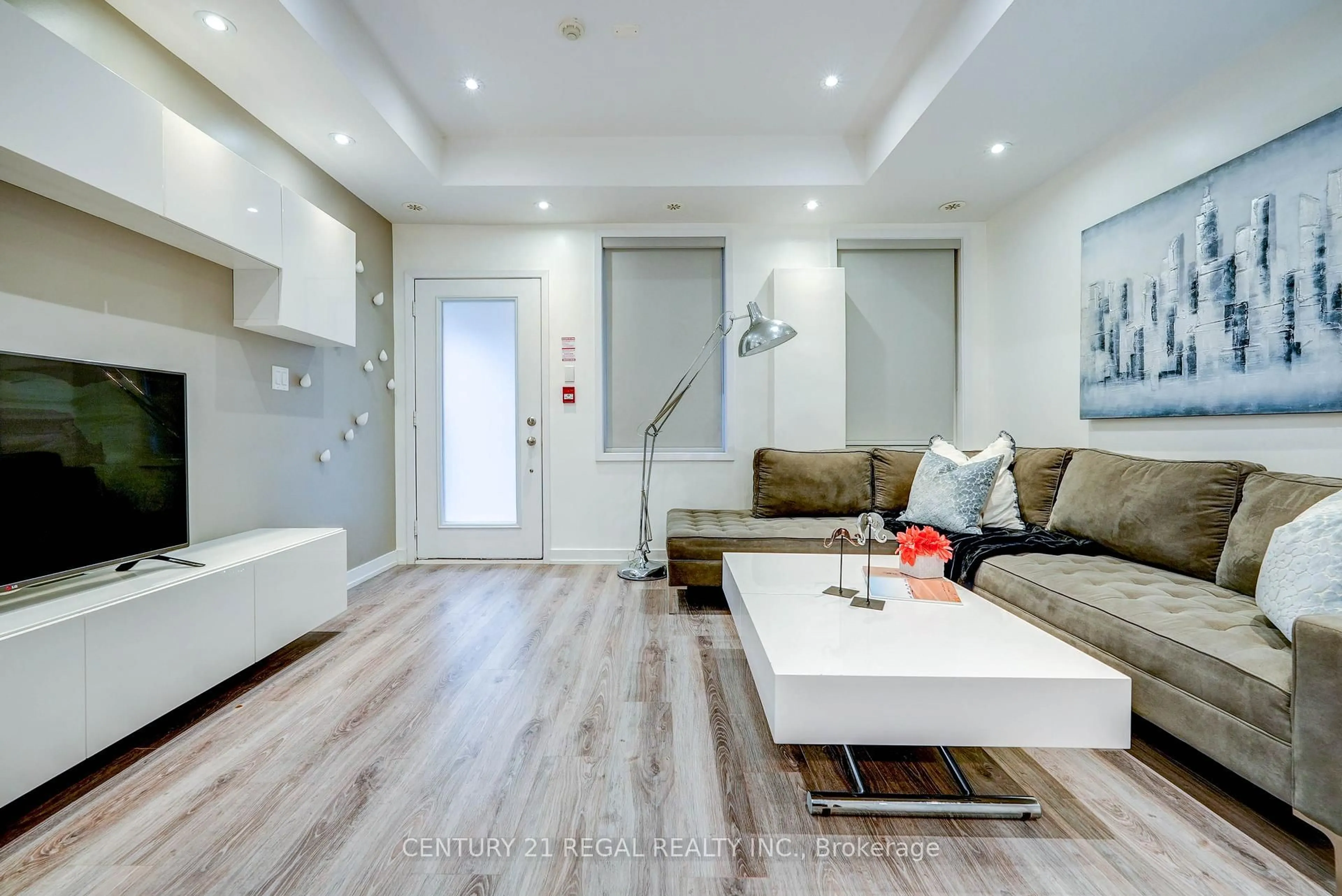 Living room with furniture, wood/laminate floor for 867 Wilson Ave #5B, Toronto Ontario M3K 0A4