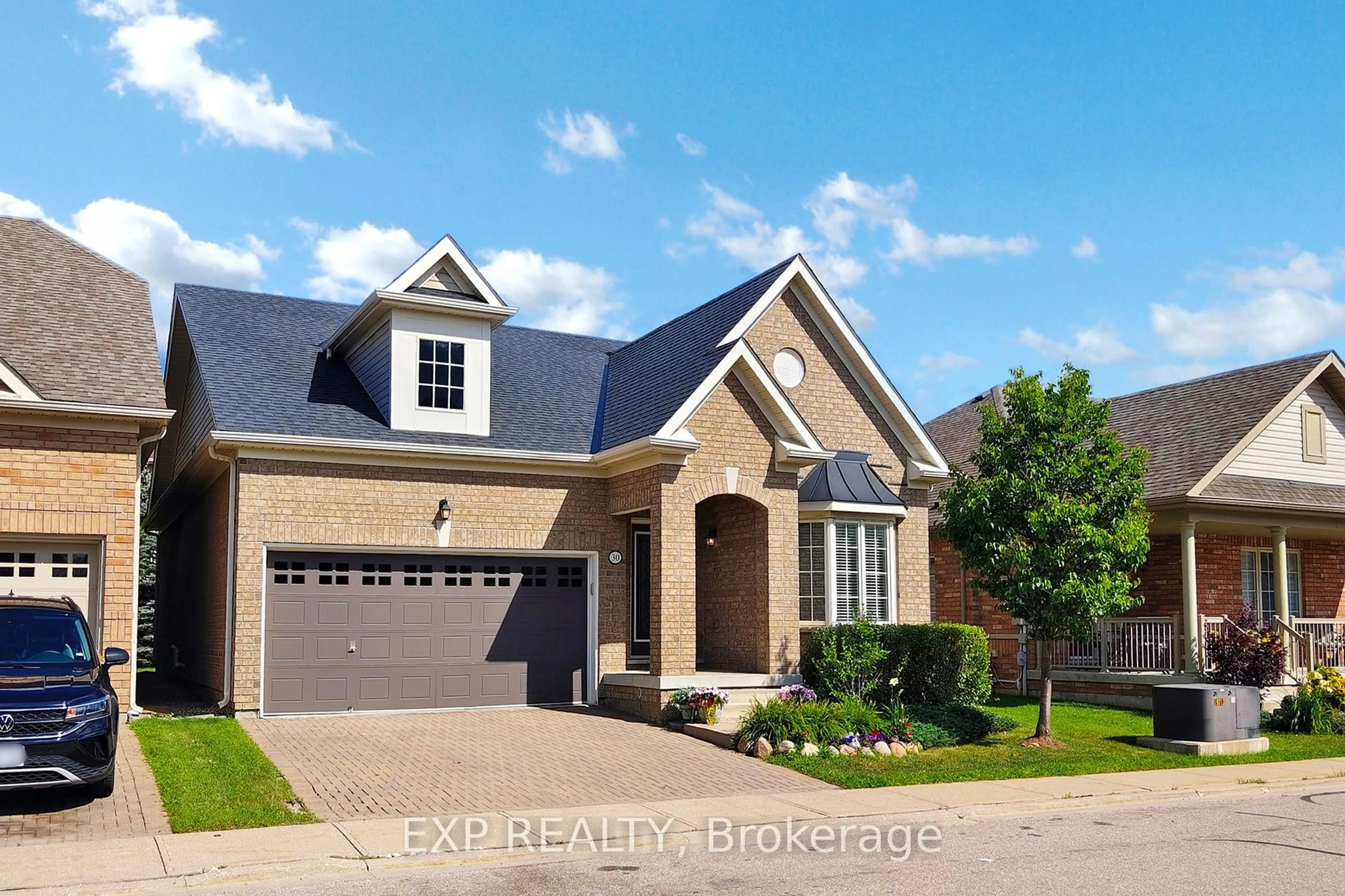 Home with brick exterior material, street for 30 Muzzo Dr, Brampton Ontario L6R 3W9