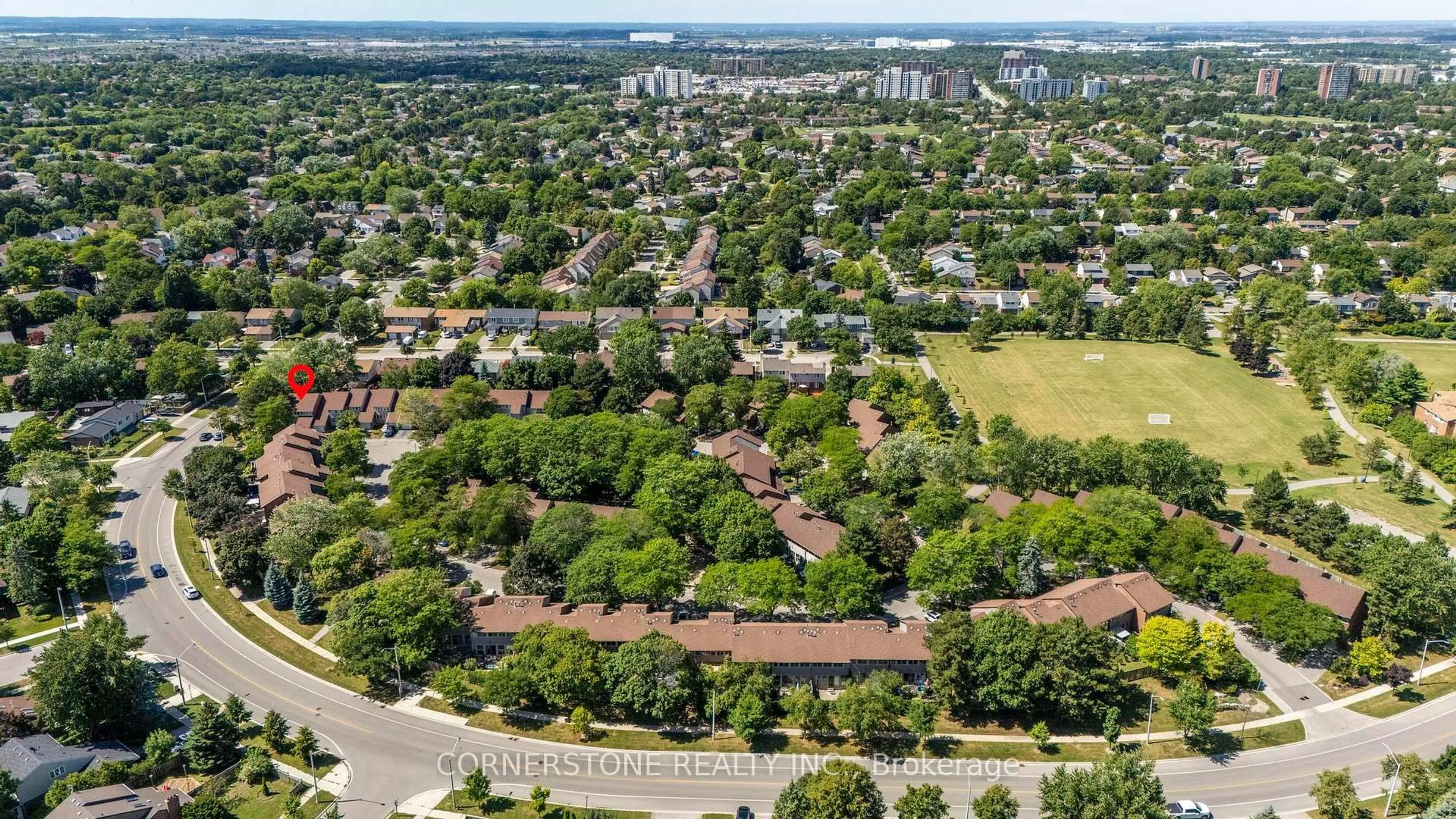 A pic from outside/outdoor area/front of a property/back of a property/a pic from drone, street for 2881 Windwood Dr #1, Mississauga Ontario L5N 2K9