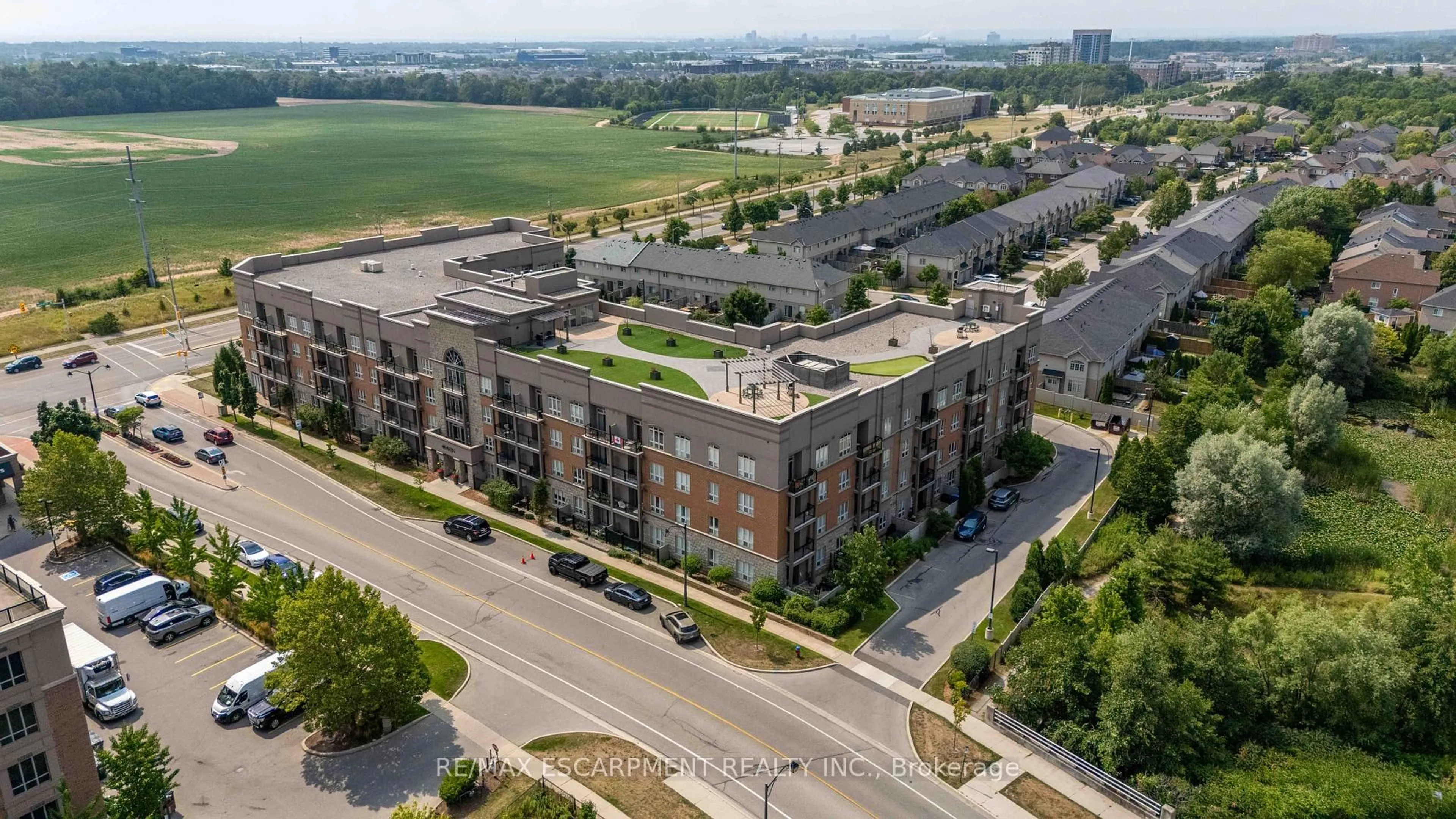 A pic from outside/outdoor area/front of a property/back of a property/a pic from drone, city buildings view from balcony for 5317 Upper Middle Rd #422, Burlington Ontario L7L 0G8